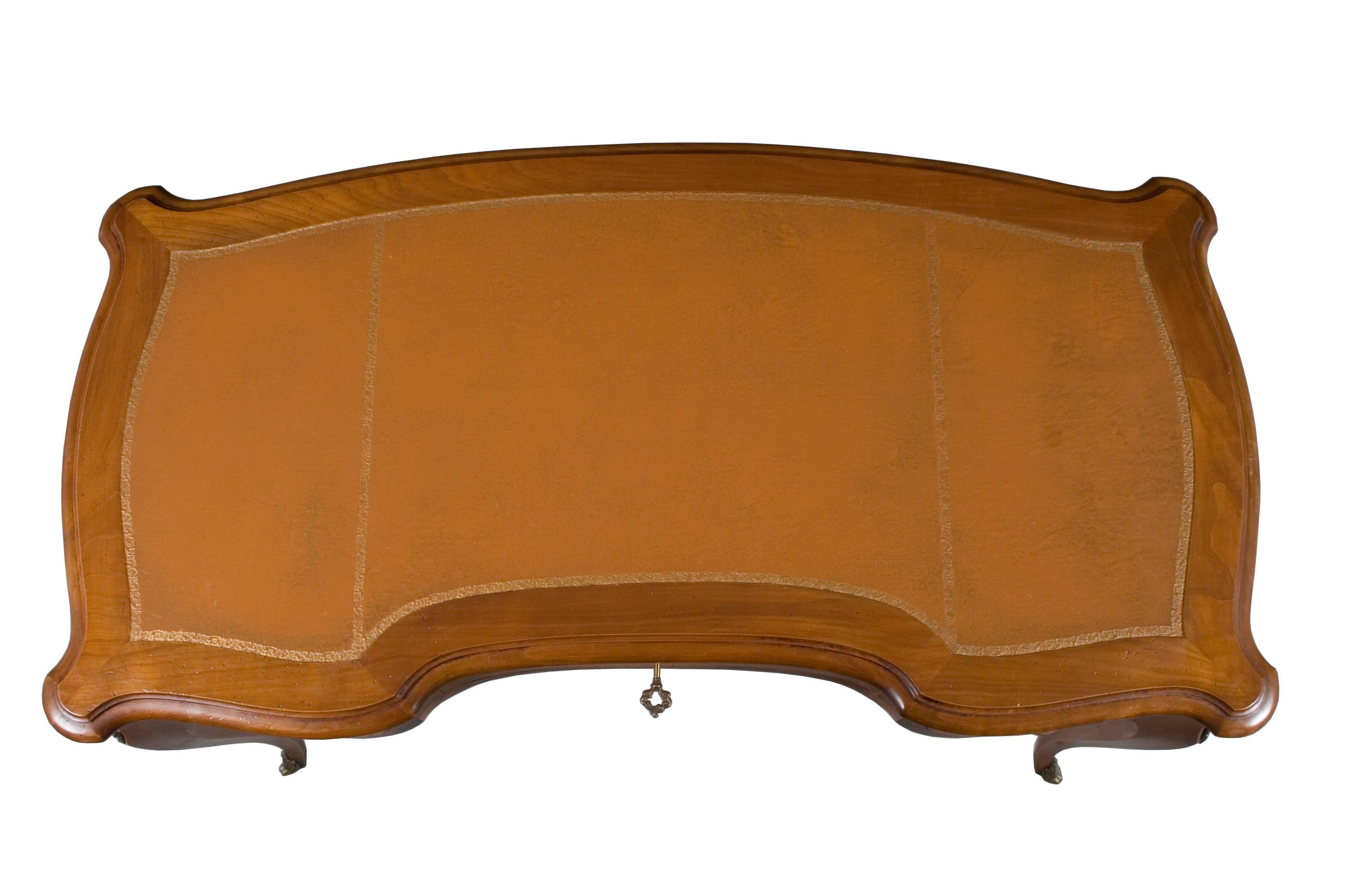 Cherry French Leather Top Shaped Writing Desk For Sale