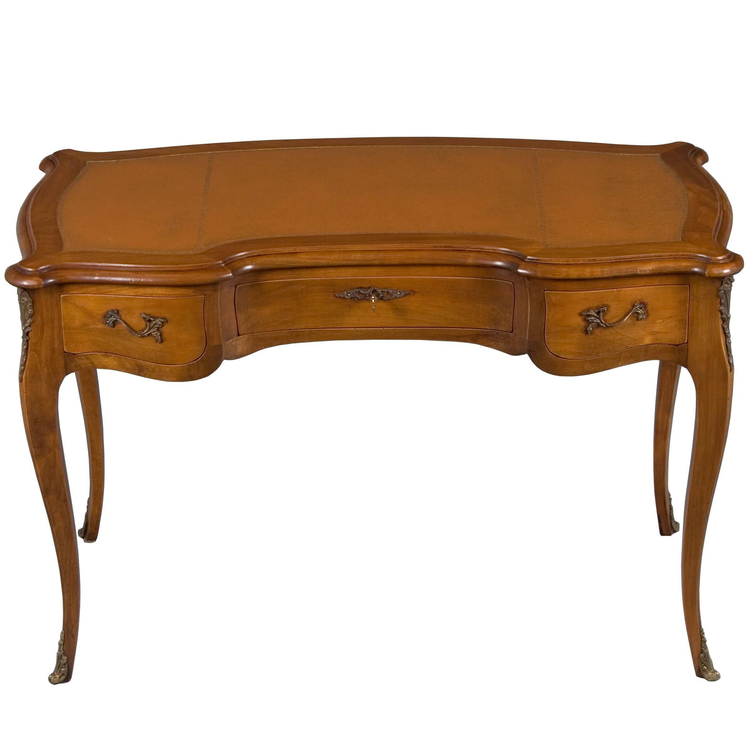 French Leather Top Shaped Writing Desk For Sale