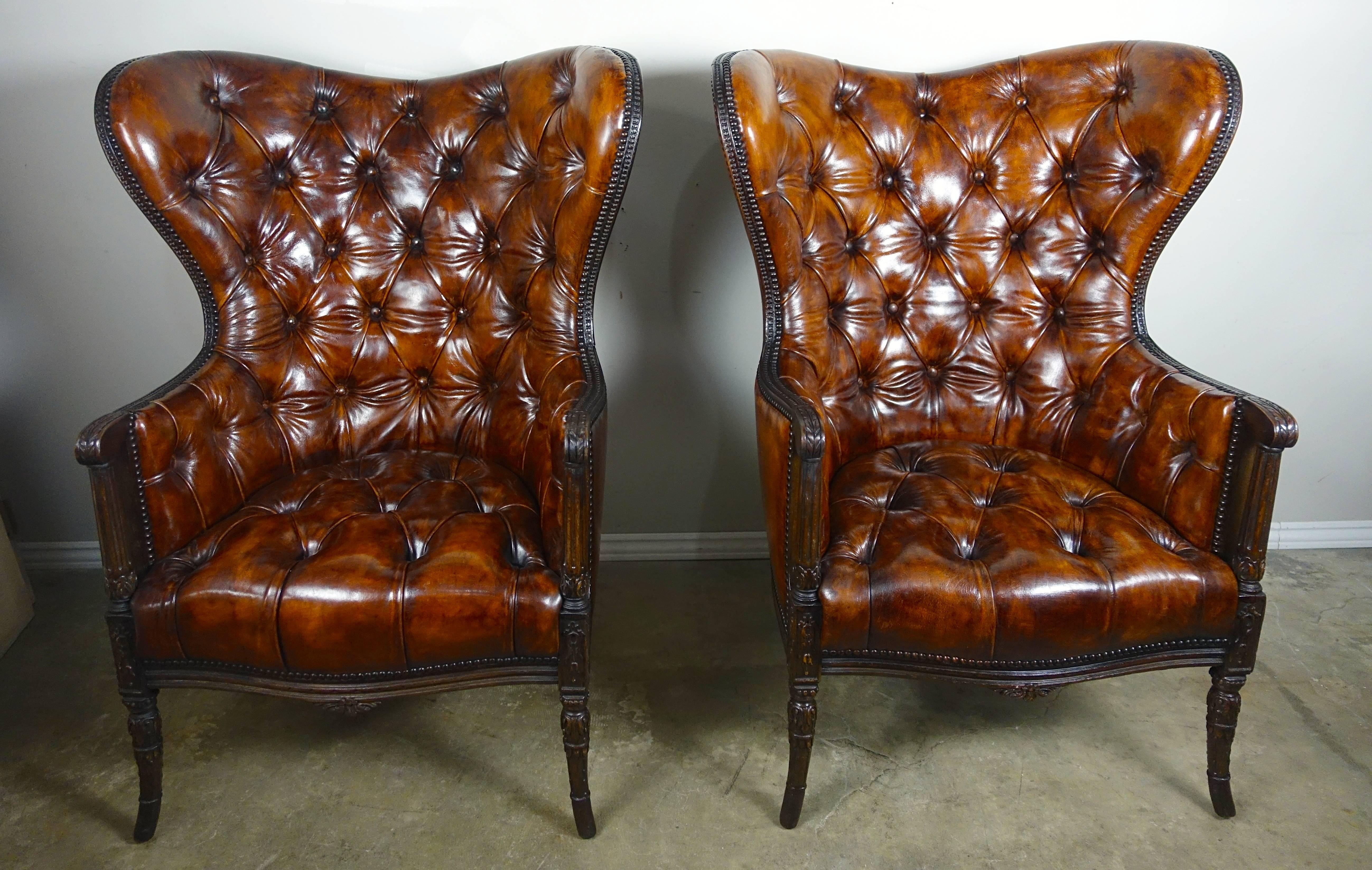 French Leather Tufted Wingback Armchairs, Pair In Distressed Condition In Los Angeles, CA