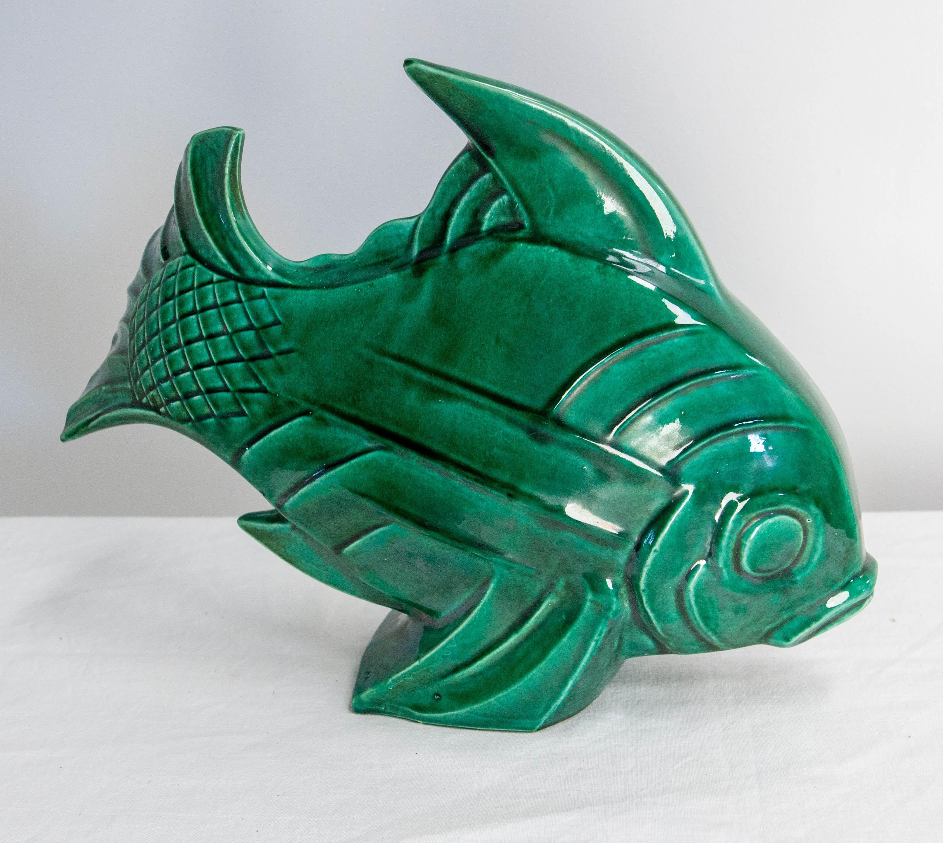 French handmade glazed ceramic fish sculpture.
Orchie was a ceramic manufacture in the North of France, near Belgium. 
This manufacture produced ceramics from 1886 to the 80's.
Lejan was inspirated by sea and animals. His statues are still in great