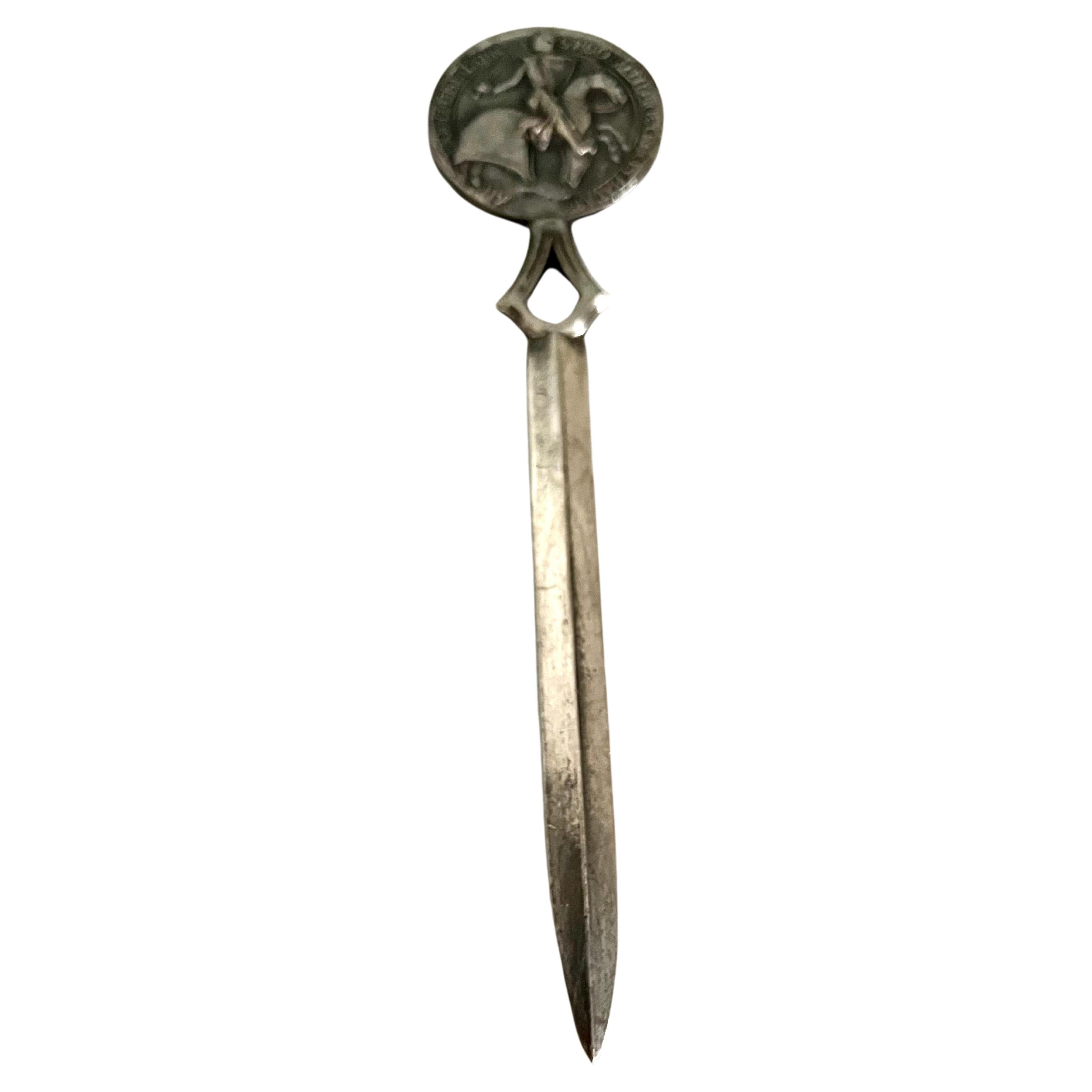 Acquired in France, a letter opener with the image of a man on a horse. a nice addition to your desk or work station.