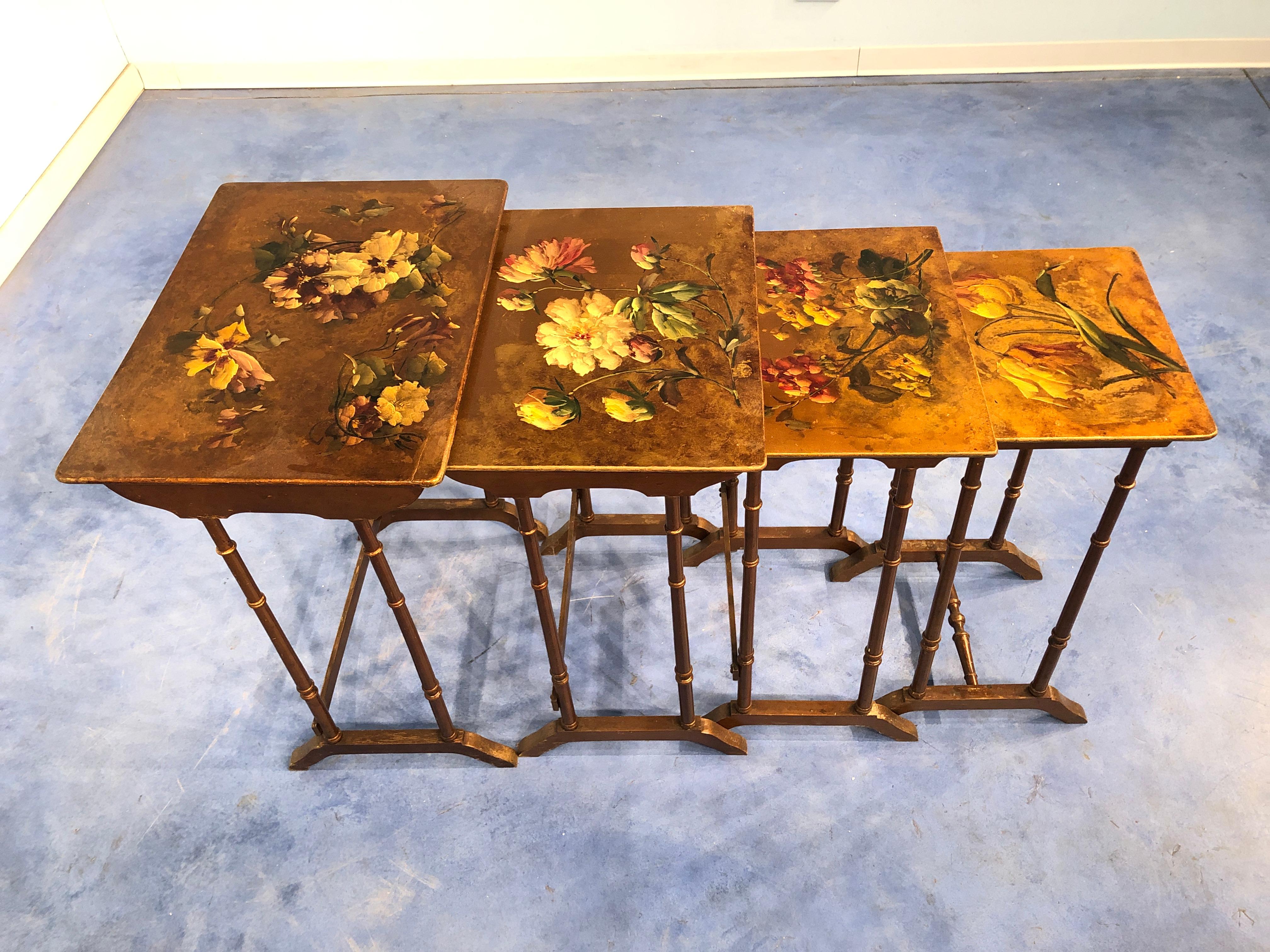 An astonishing batch of 4 coffee tables,
on the top decorated with floral painting in the Liberty style.
You can see also legs in bamboo shape, a characteristic element from the period. 

Originals of the era, no reproductions.
In very good