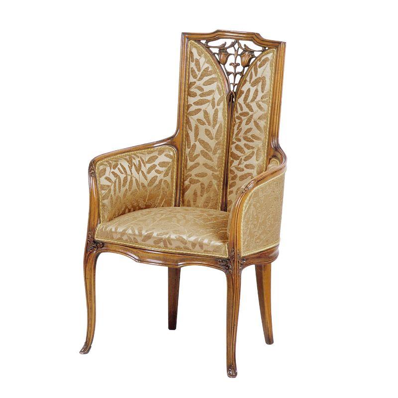 Originally designed by French designer from the Art Nouveau period Louis Majorelle, this gorgeous armchair is characterized by an elegant golden upholstery of Liberty style. A sublime design that will effortlessly complement a refined interior, it