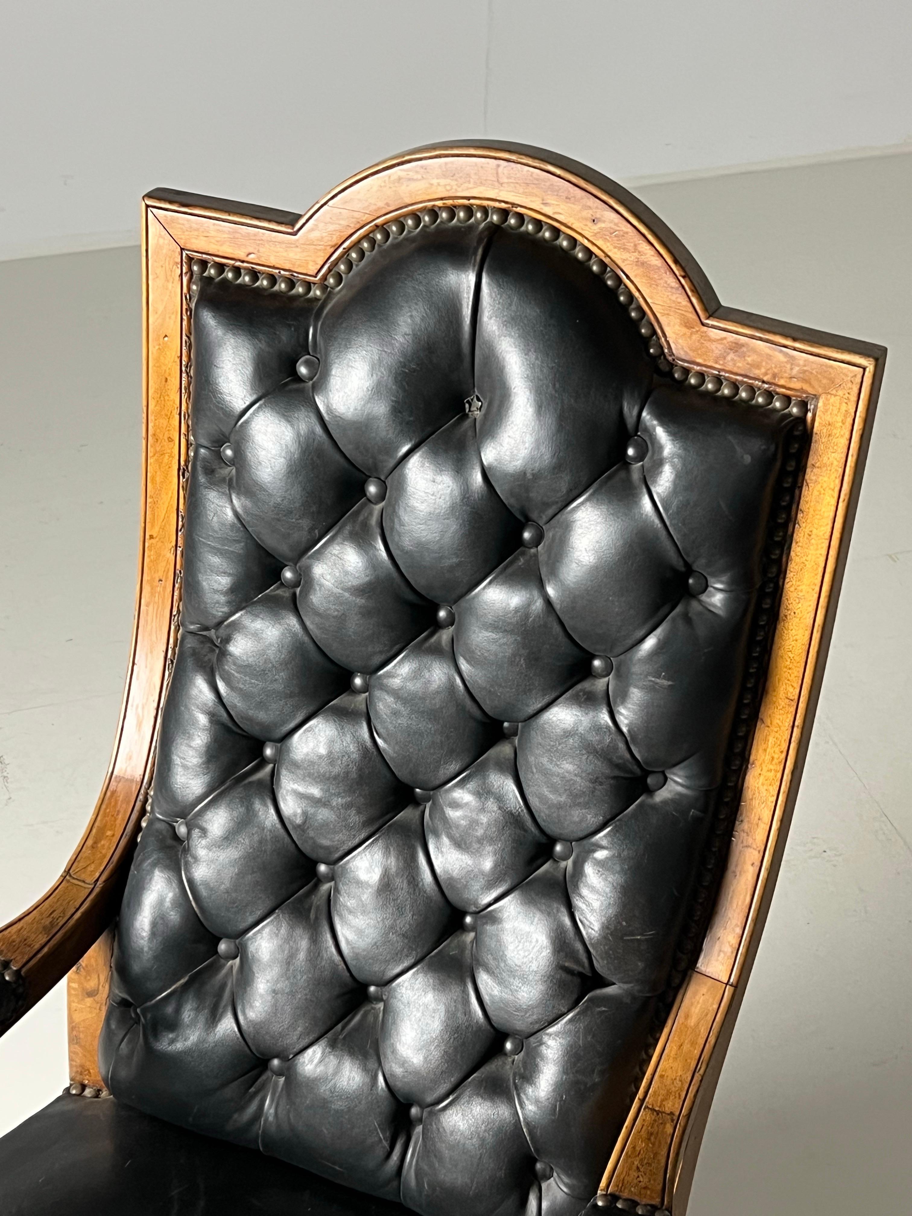 Truly beautiful French armchair. Black leather. Beautiful colour and patina. Wonderful comfort. France, ca 1900.

Dimensions: 62w x 76d x 109h