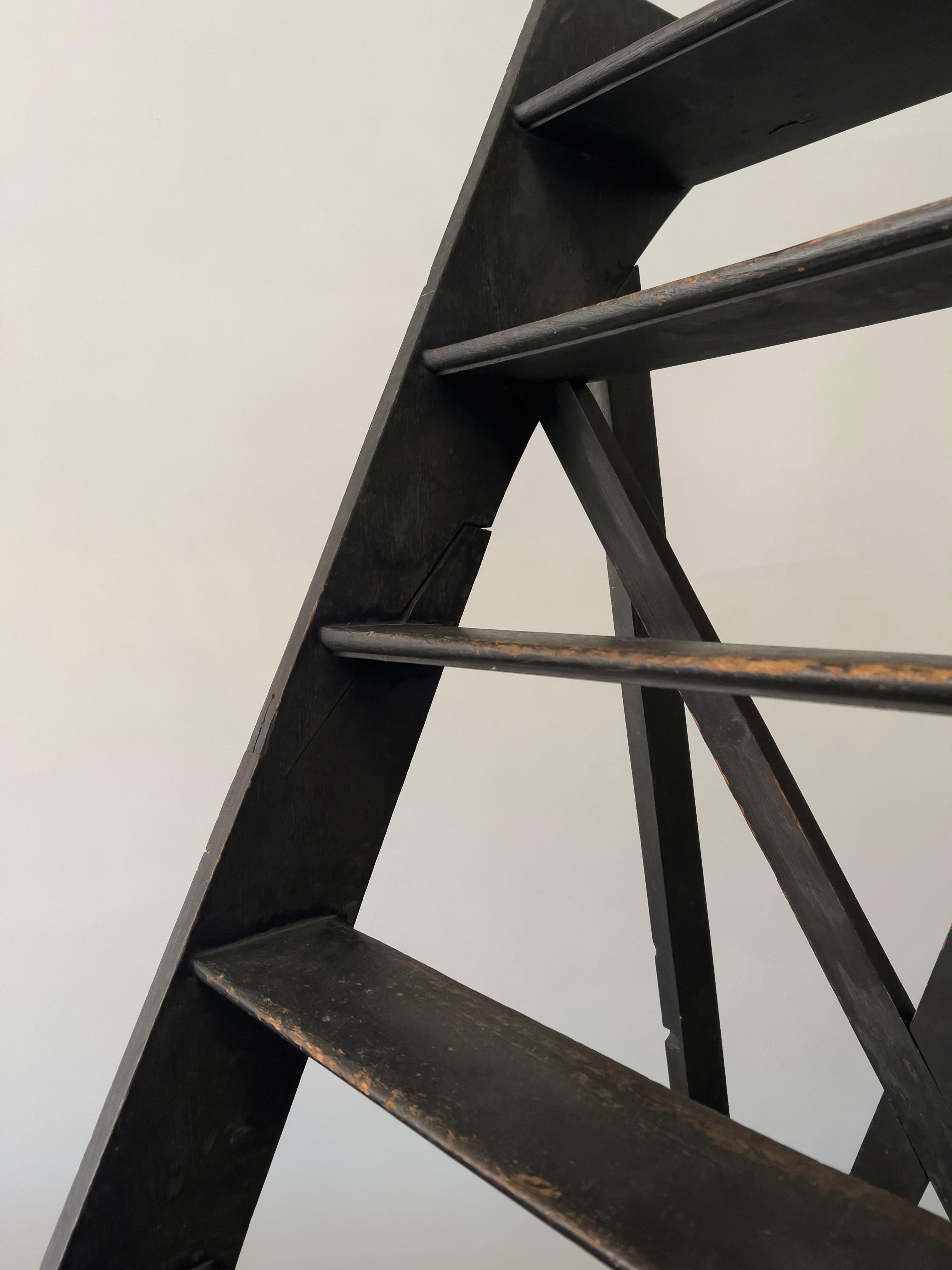 France, ca. early 1900s

Antique ladder with All wood joinery with excellent structural integrity. Original black paint on wood. Ladder has clean lines and finish has beautiful patina. Wear consistent with age.

22