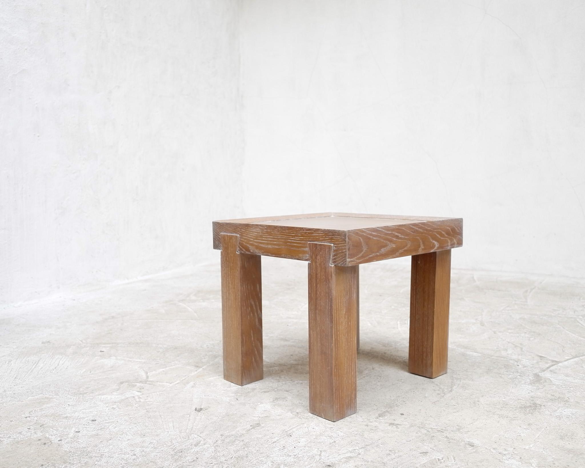 A small French deco/modernist side table in limed oak.

Unusual emphasised dovetail jointed legs.

-

We offer free shipping to the USA/Canada through Fedex with this item.
