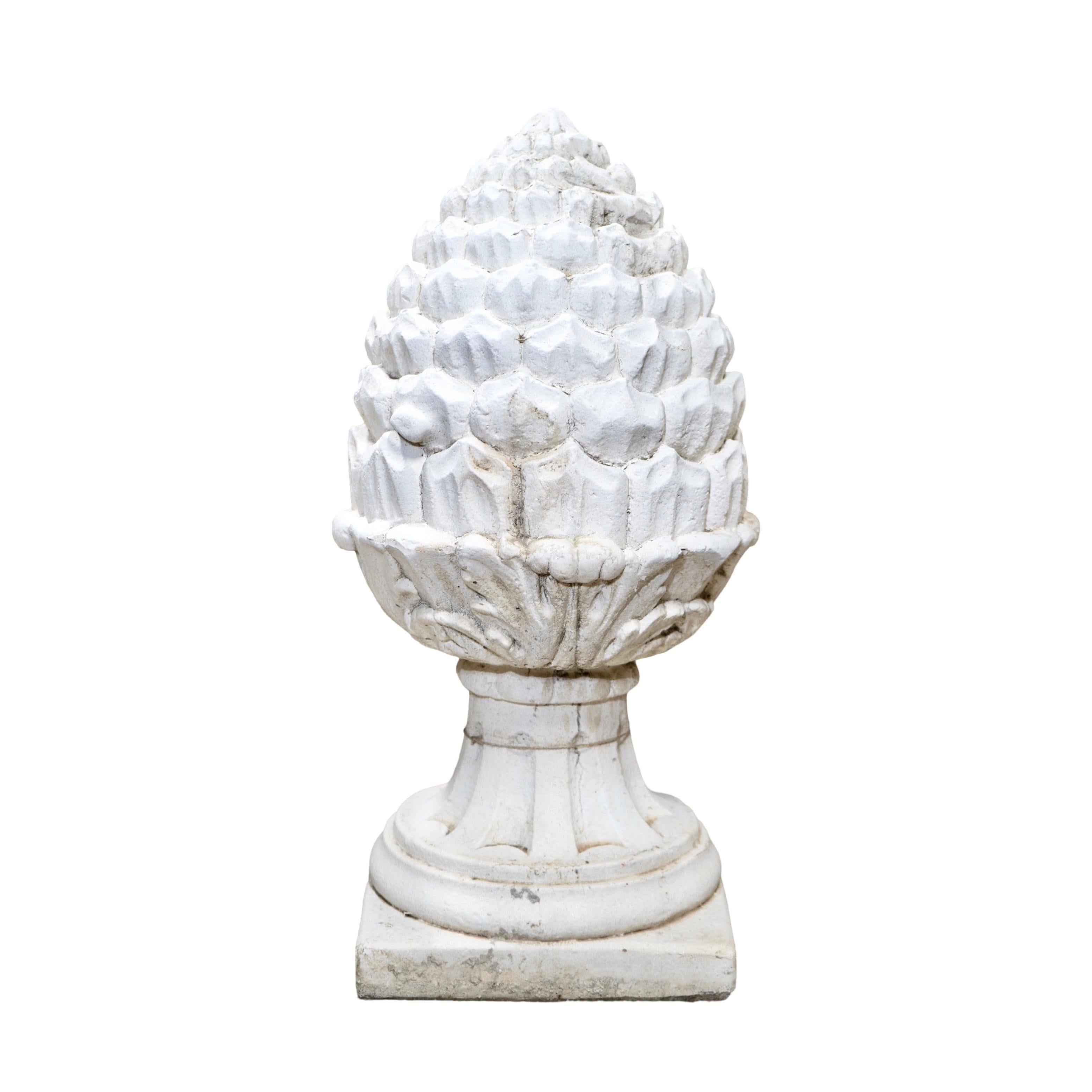 This contemporary Medici-style acorn sculpture is carved from French limestone, showcasing its elegant design. Made with expert craftsmanship, this piece adds a touch of sophistication to any outdoor space and is perfect for those who appreciate the