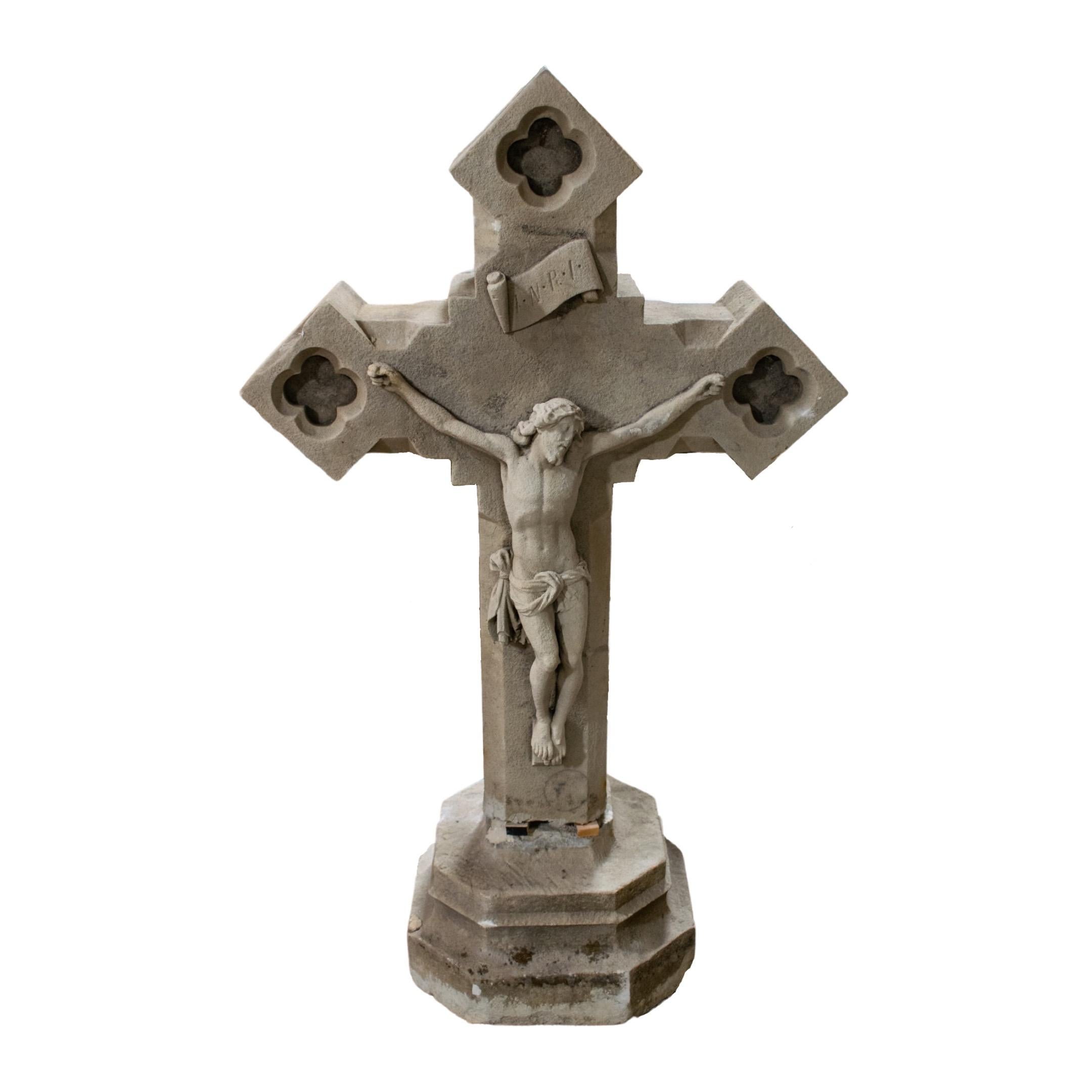 Cross with a craved depiction of Jesus. Made out of Limestone. Originates from France. Circa, 18th c.