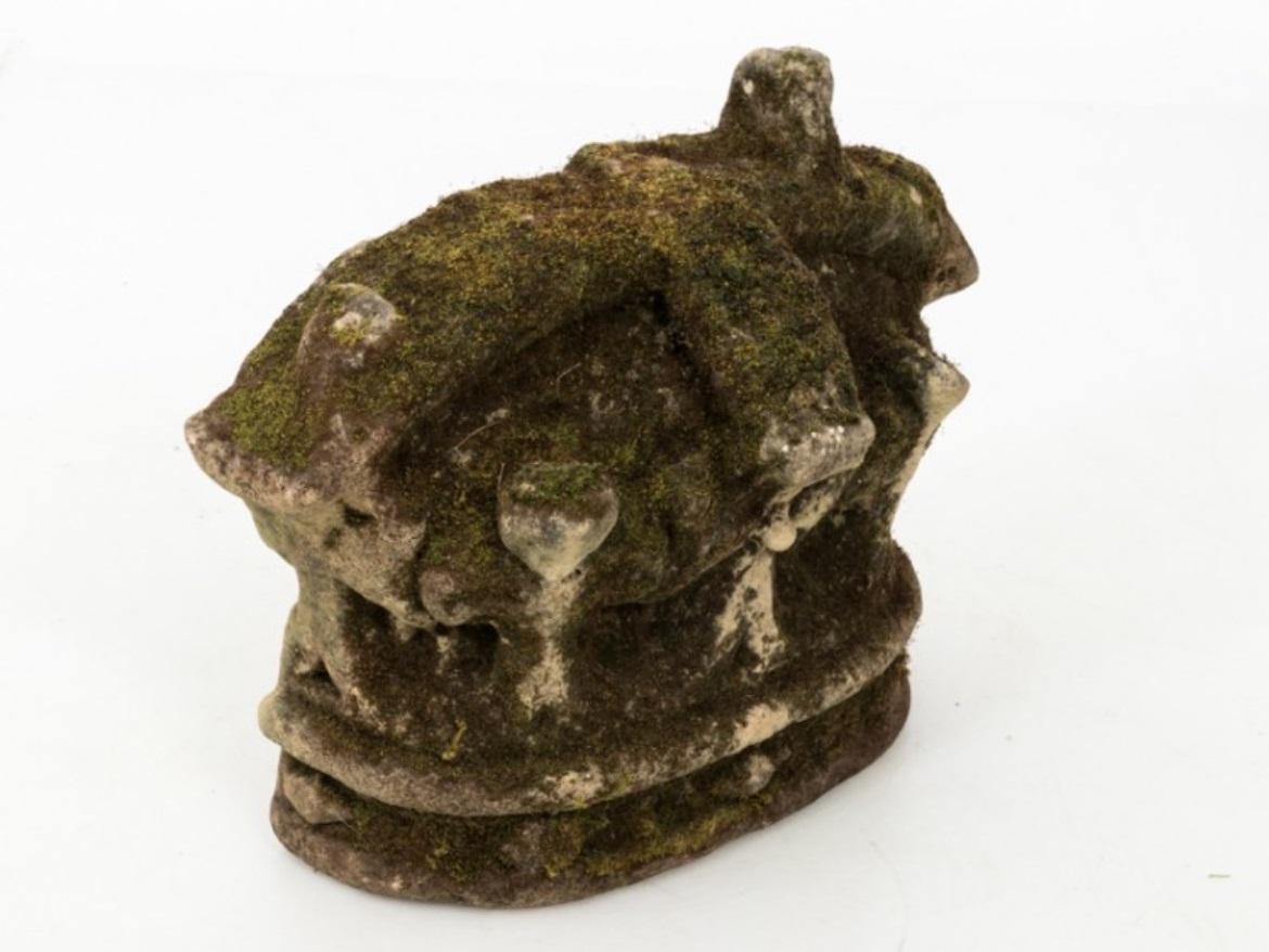 Substantial 18th century limestone crown from France. A baroque architectural element once mounted on a building, this decorative stone crown has been salvaged and reclaimed as a romantic garden ornament. Beautiful weathered surface is covered in