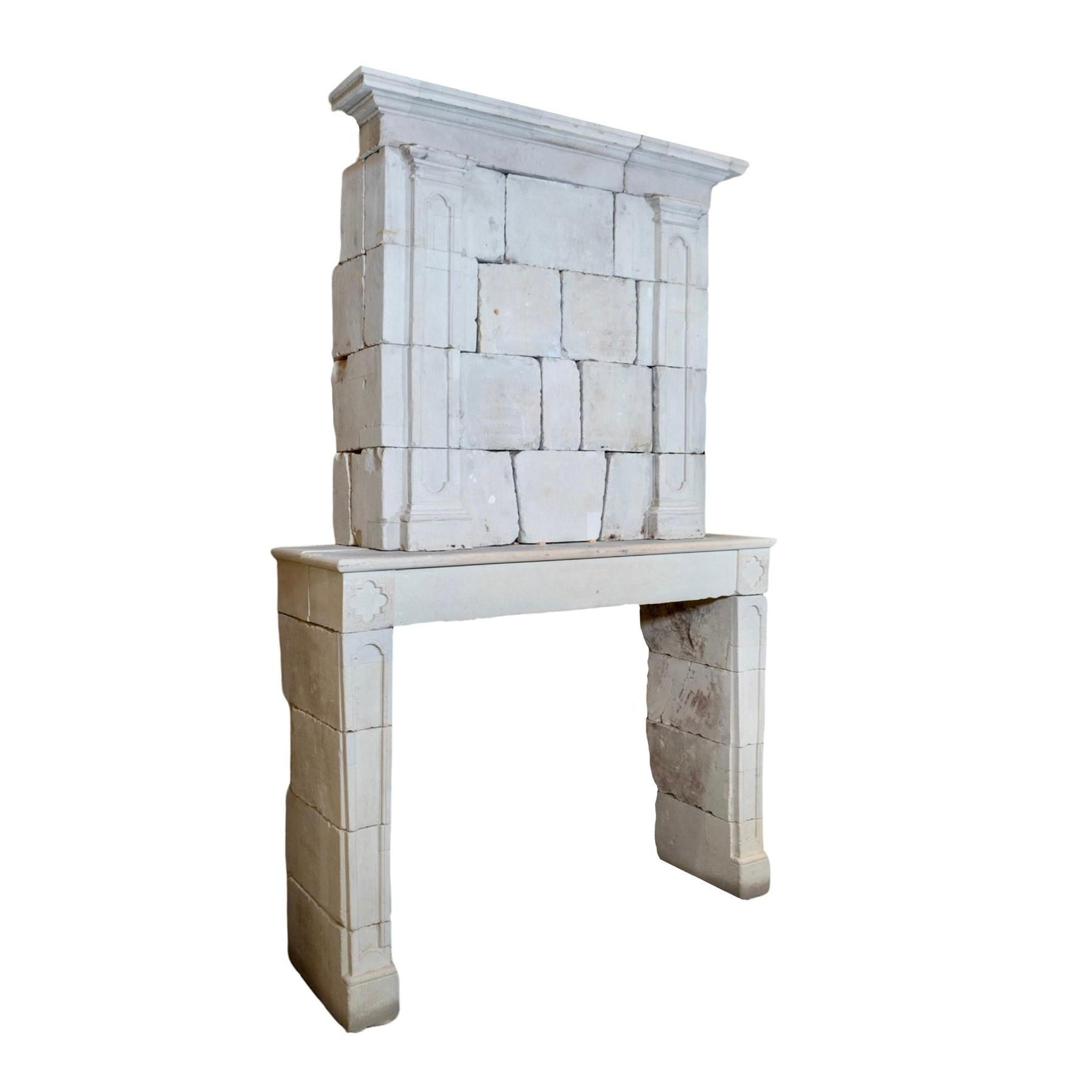 Early 18th Century French Limestone Fireplace For Sale
