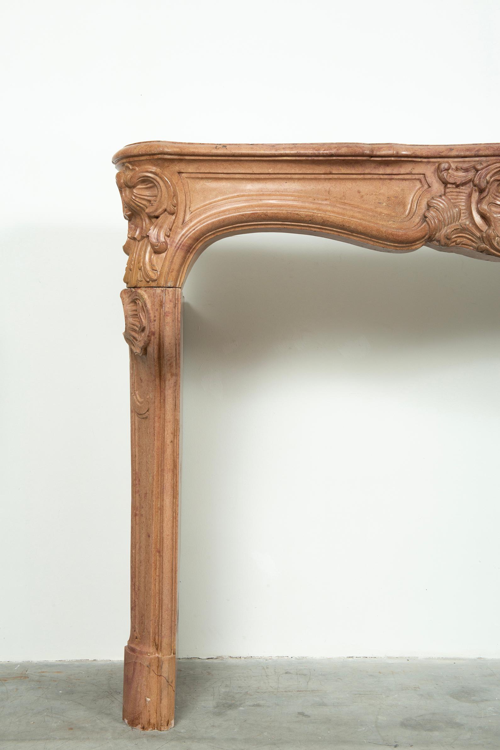 18th Century and Earlier French Limestone Louis XV Fireplace For Sale