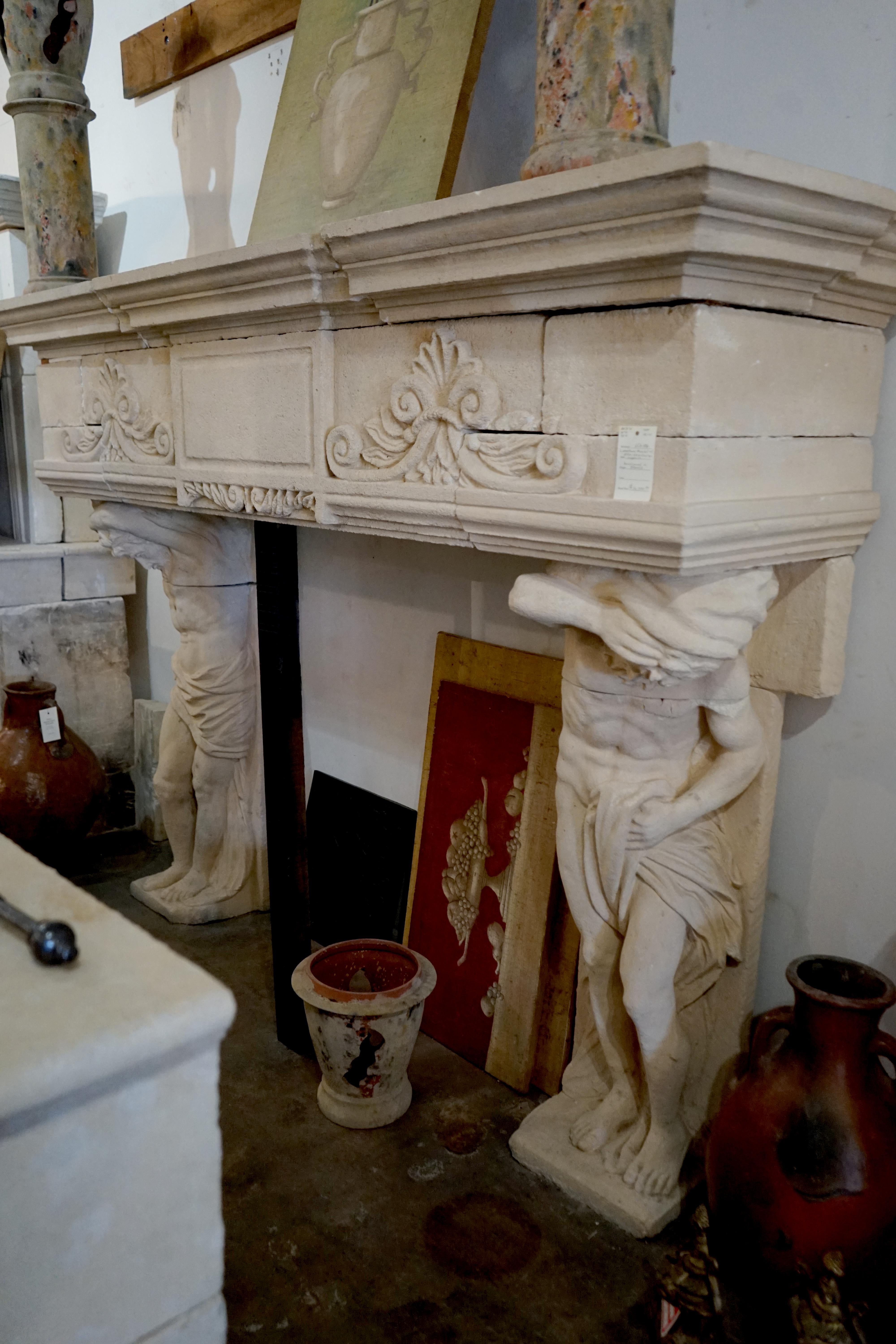 Monumental hand carved French limestone mantel supported by two finely detailed Atlas figures. Large rectangular cartouche on lintel flanked by scrolling palettes.

Origin: France

Measures: Firebox 52
