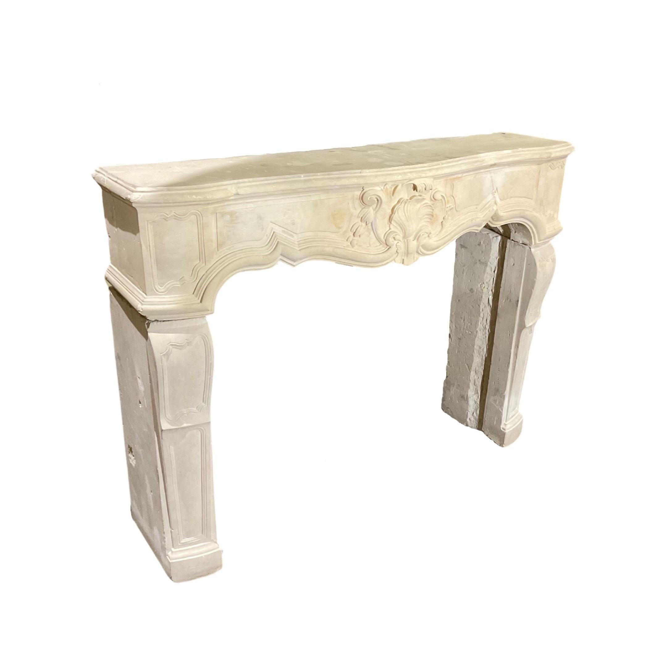 Louis XVI-style mantel. Made out of Limestone. Originates From France. Circa, 1850.