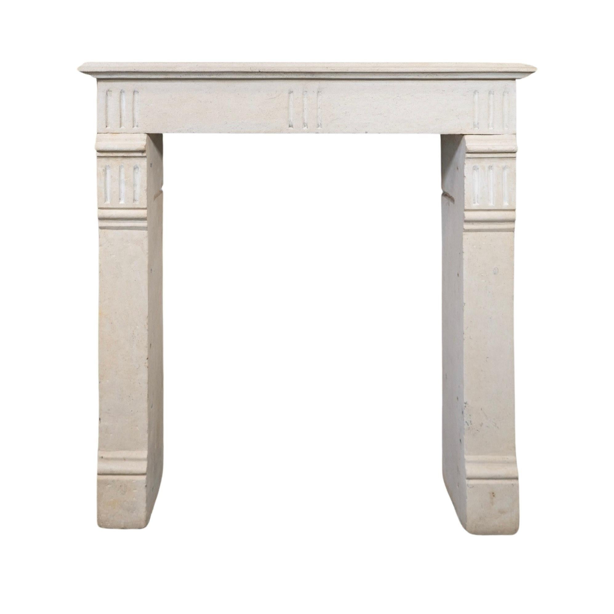 Crafted from French Limestone, this circa 1850 mantel exudes timelessness and elegance. Its petite size adds a subtle touch of sophistication to any room. Imported from France, this mantel is the perfect addition to your home.