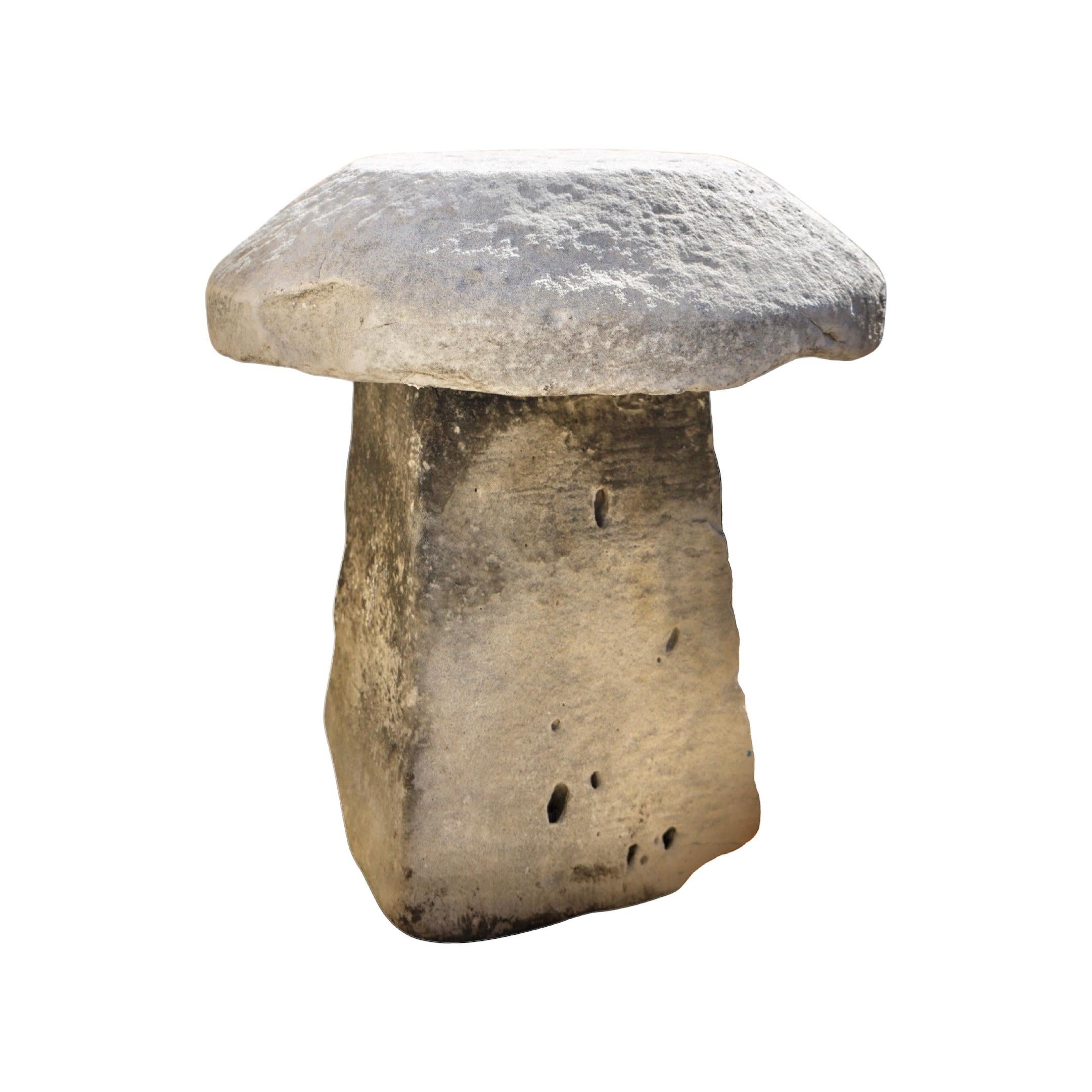 Crafted from high-quality limestone, this staddle stone pillar is a stunning piece of history from 17th-century France. Bring a touch of elegance and sophistication to your home with a touch of rich, European heritage. Perfect for adding character