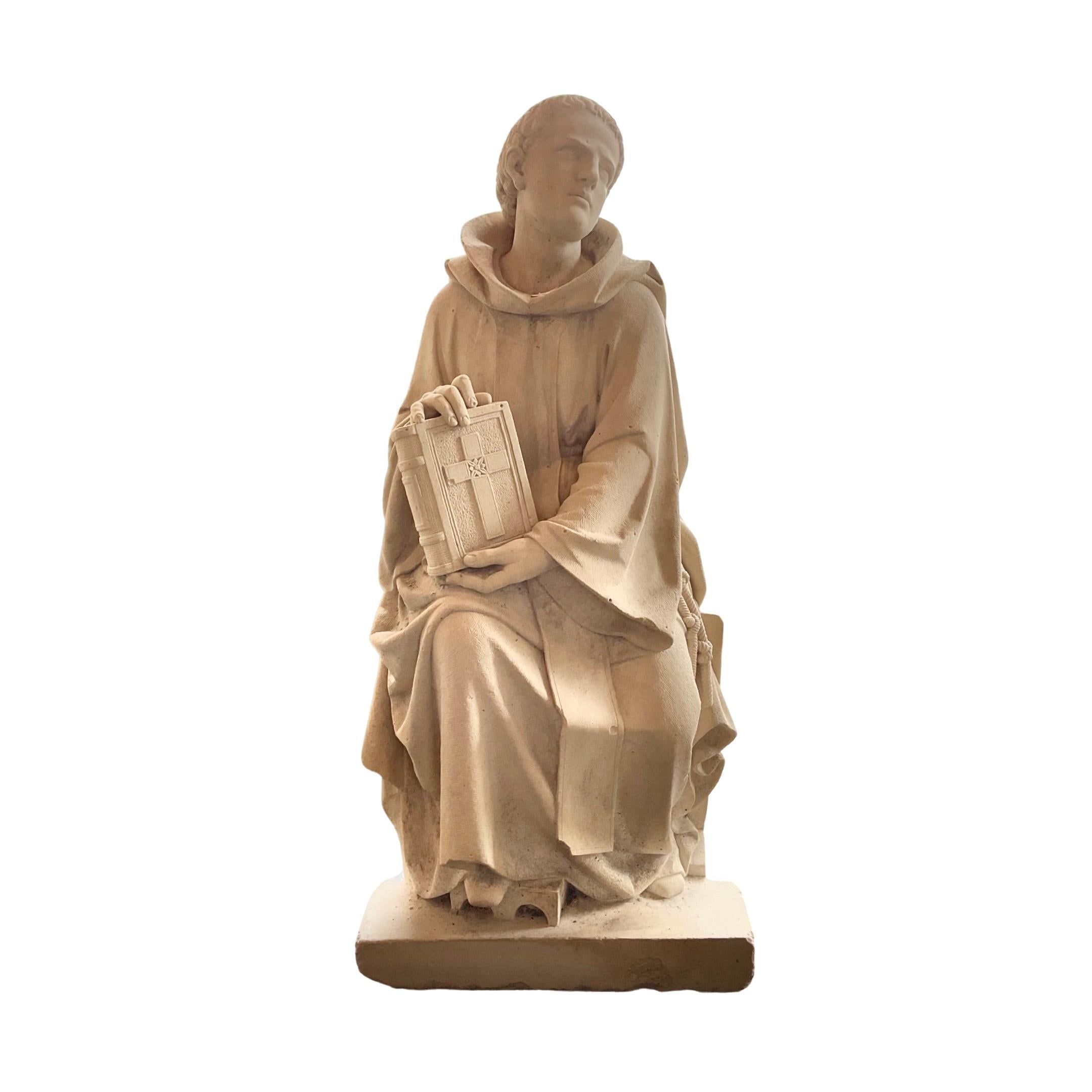 This French Limestone Saint Sculpture is a remarkable 17th century example of skilled artistry, enduringly fashioned from French Limestone to preserve its aesthetic legacy.