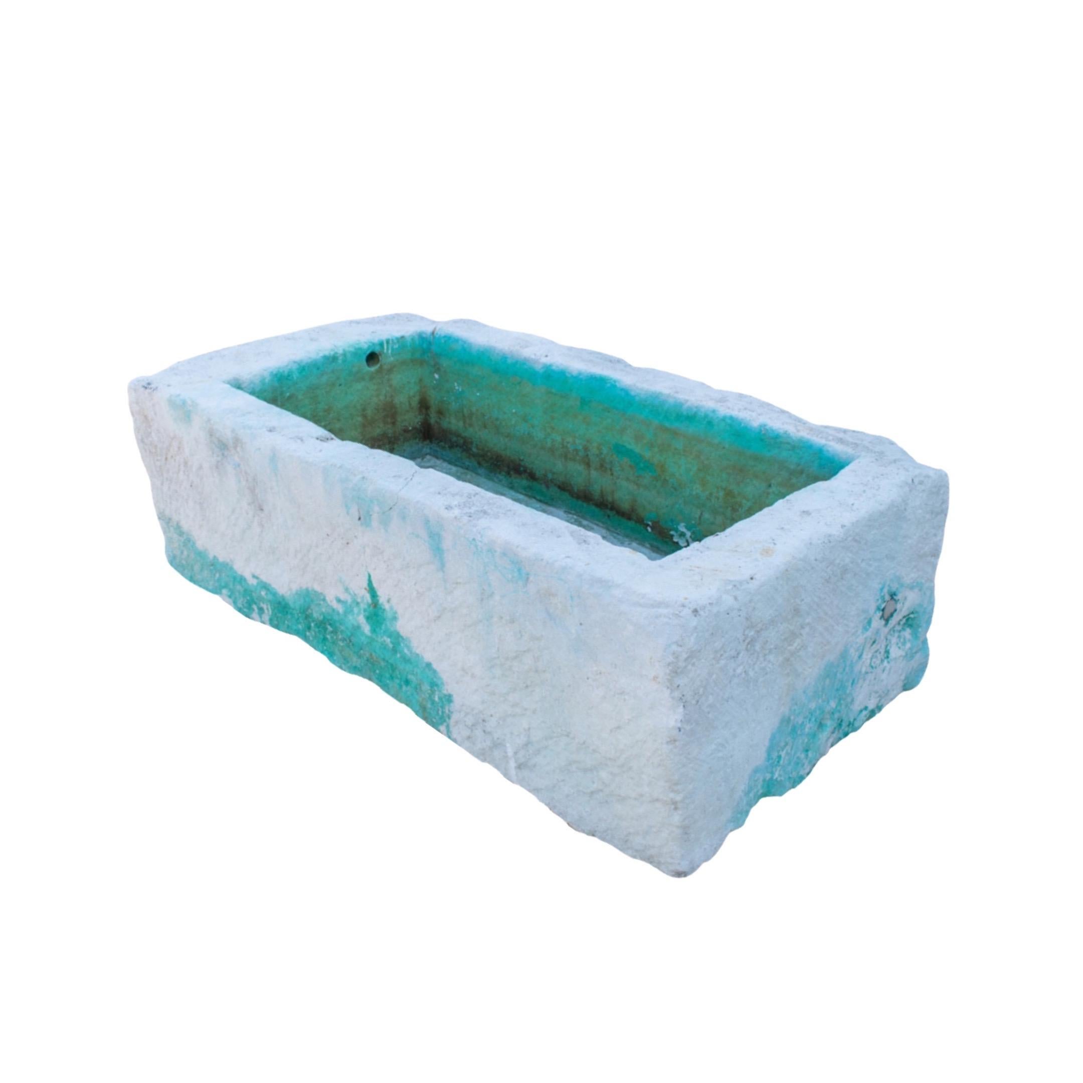 Our French limestone trough is perfect for your garden or patio. Medium size, crafted from robust limestone, it brings beauty and durability to your outdoor space. It is a great choice for storing water, flowers, and other plants. With its timeless