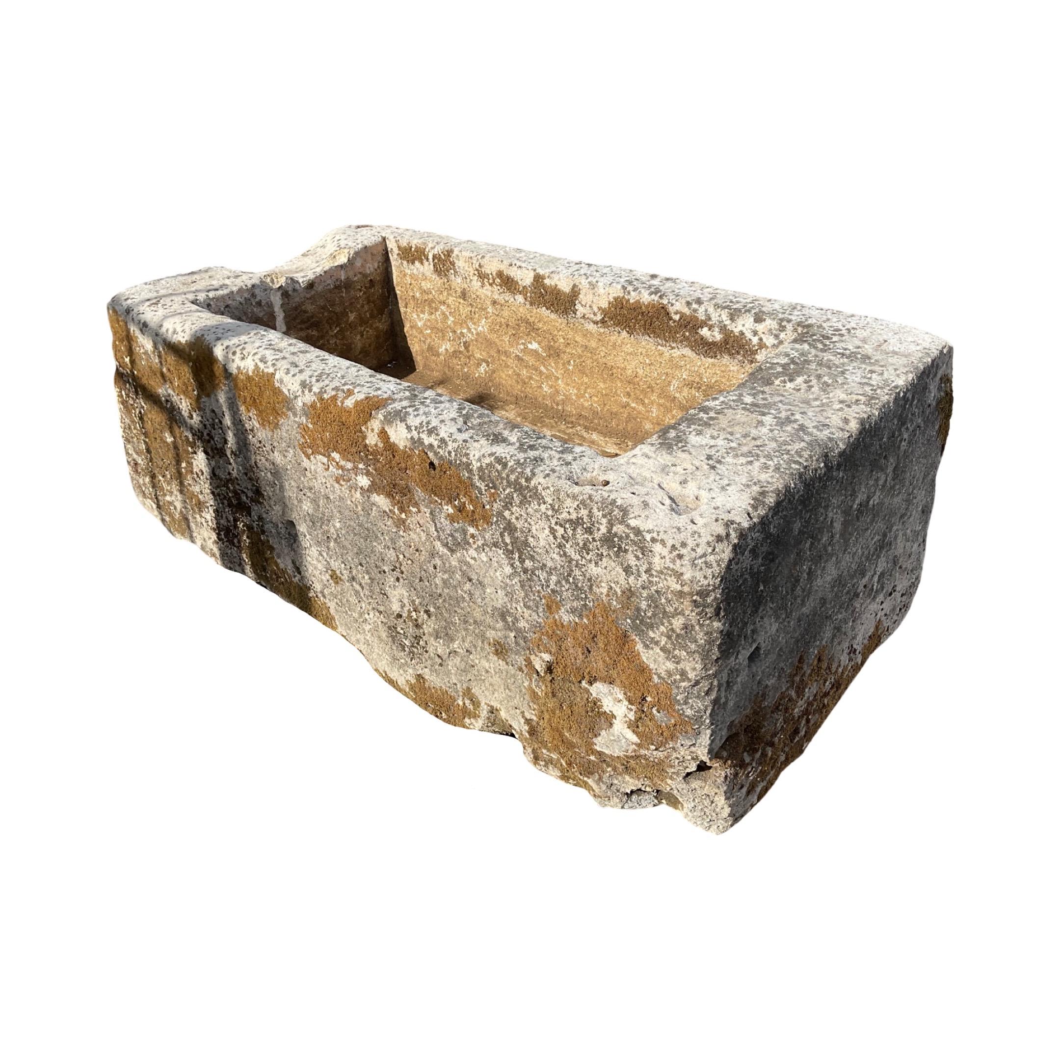 This 17th-century French limestone trough offers an elegant rectangular shape for a unique and beautiful piece of history. Perfect for use in gardens or other outdoor areas, this stone trough provides a durable and timeless accent.