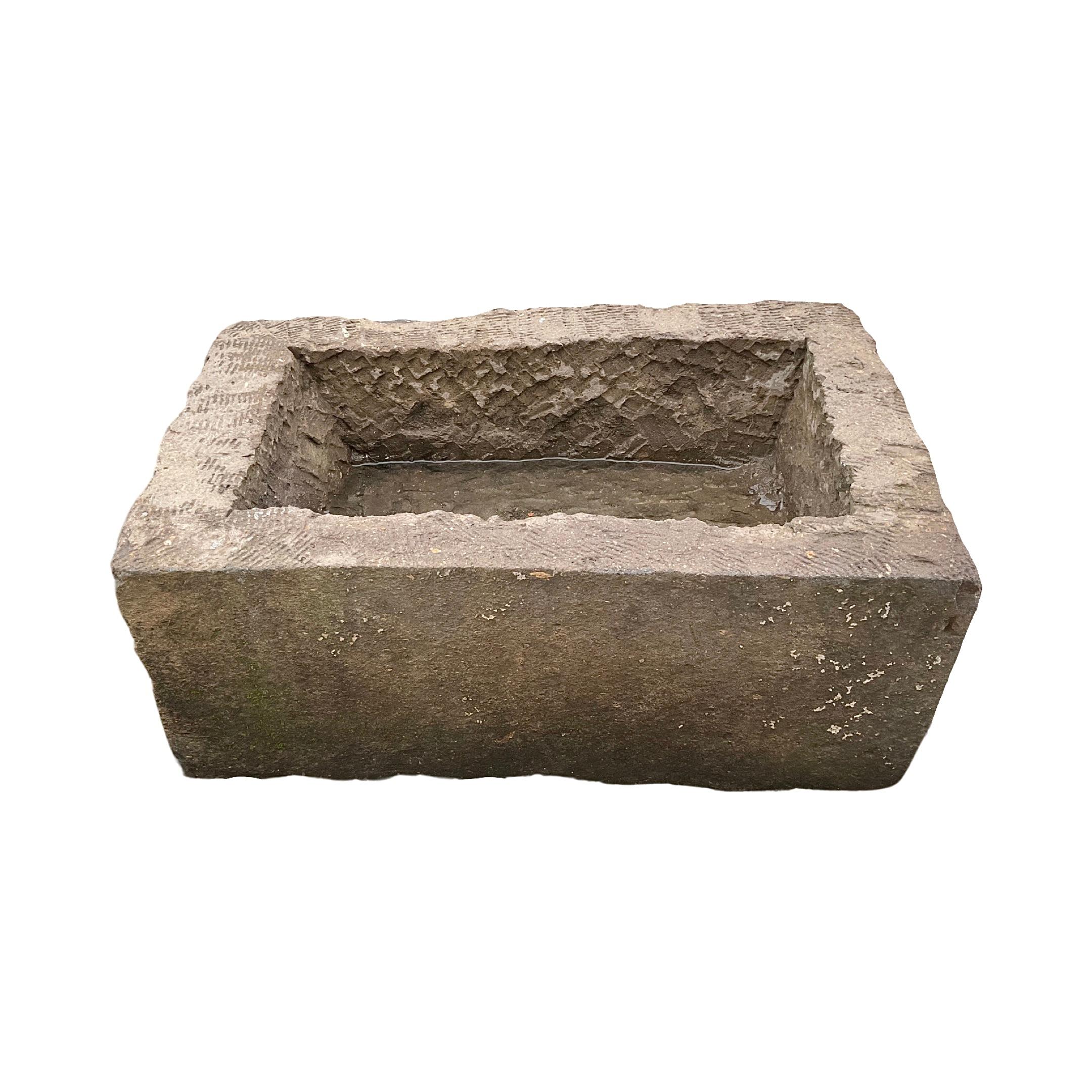This French Limestone Trough is a small style size trough made in France during the 18th century. Crafted from high-quality limestone, it offers a touch of elegance and sophistication to any outdoor or indoor space. Its smaller size makes it
