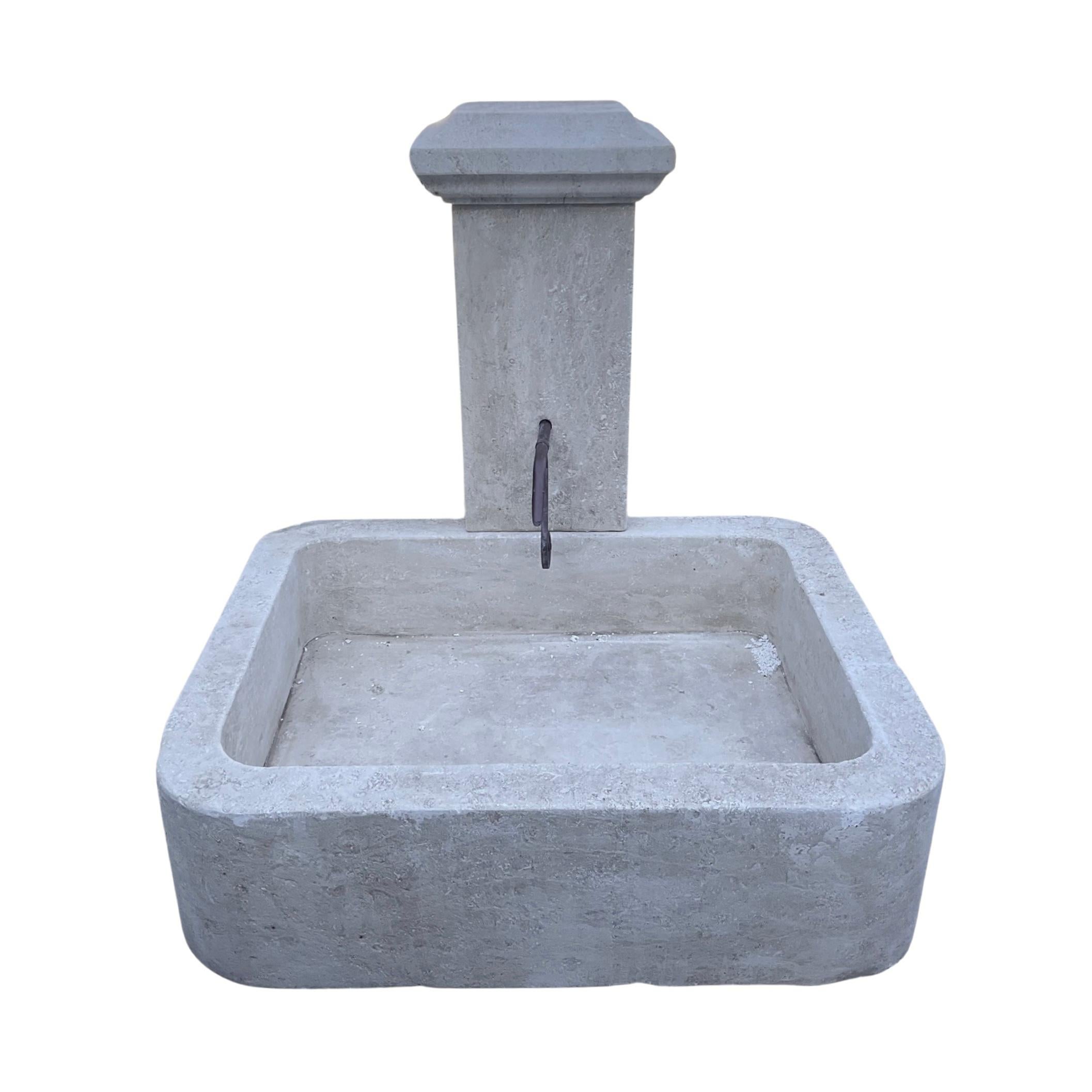 This beautiful French Limestone Fountain combines fine hand-carved artistry and durable construction. Boasting a large size basin in the center and a spout, this newly carved fountain is perfect for creating a tranquil outdoor escape. 