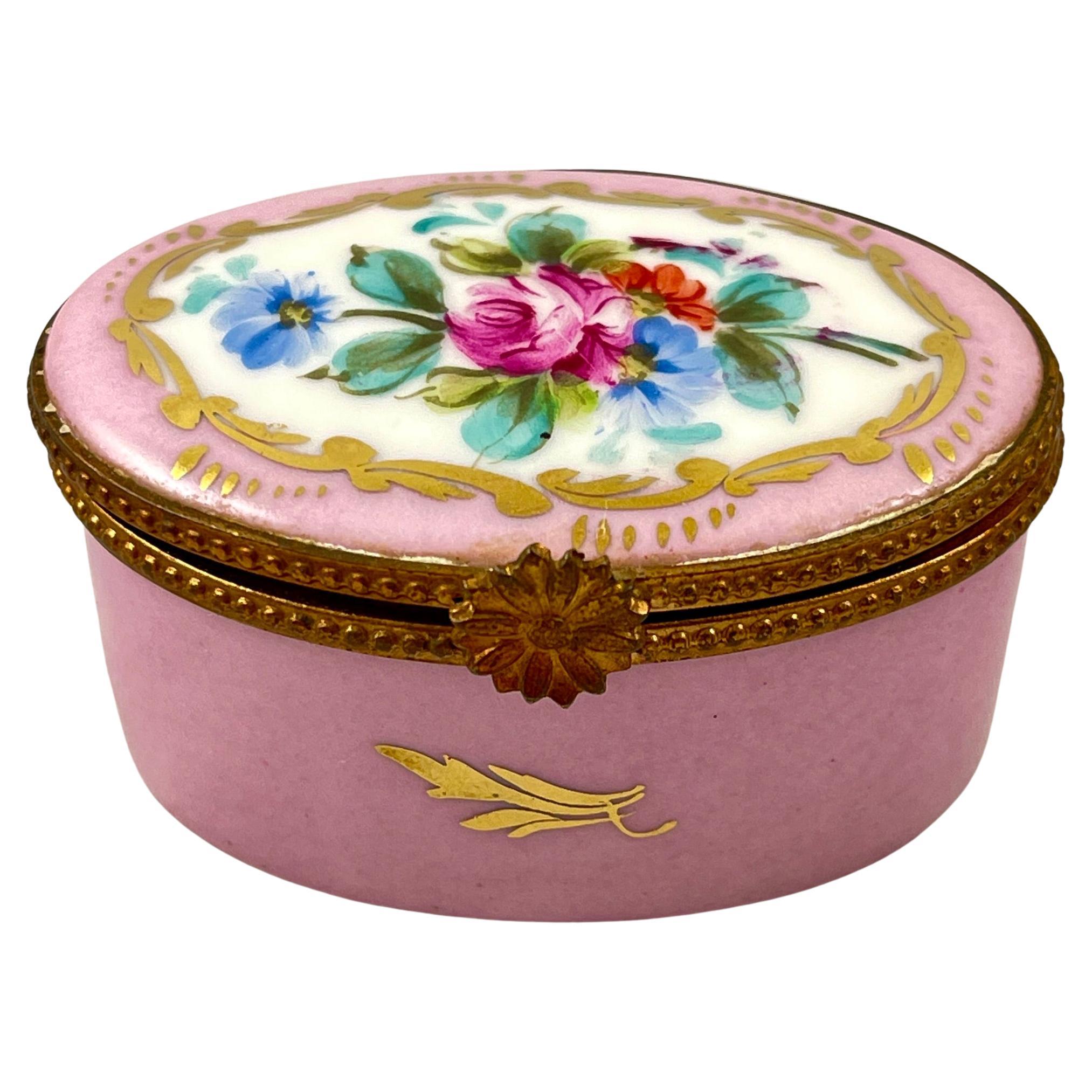 Caja ovalada de baratijas Limoges francesa pintada a mano con flores rosas