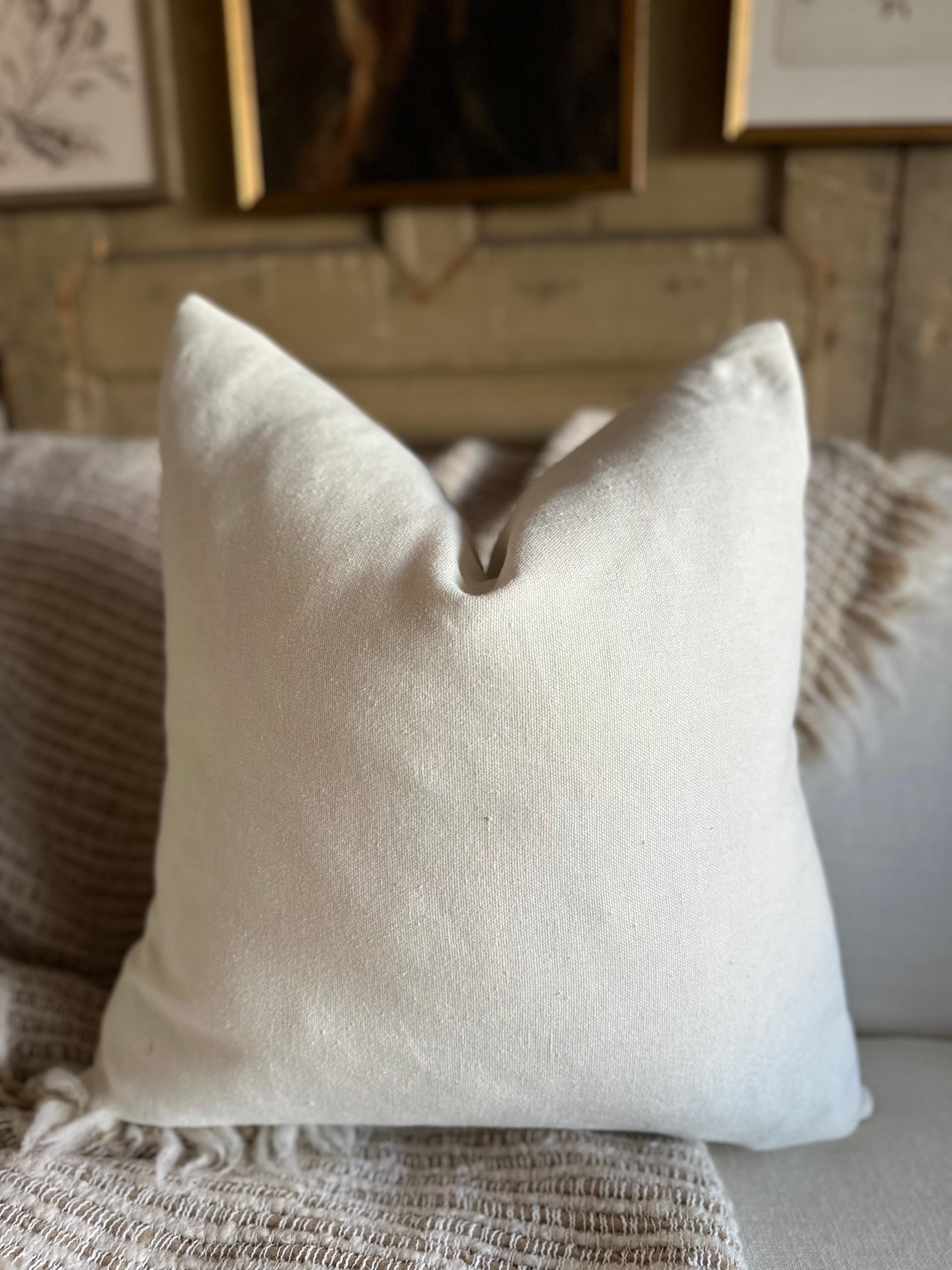 A luxurious heavy woven linen face with stone washed linen back.
Linen fabric is imported from France.
Custom made to order, can be customized to your size.
Color: Blanc / Oyster
Antique brass zipper
Size 22x22
Includes Down Feather Insert
Care: Can