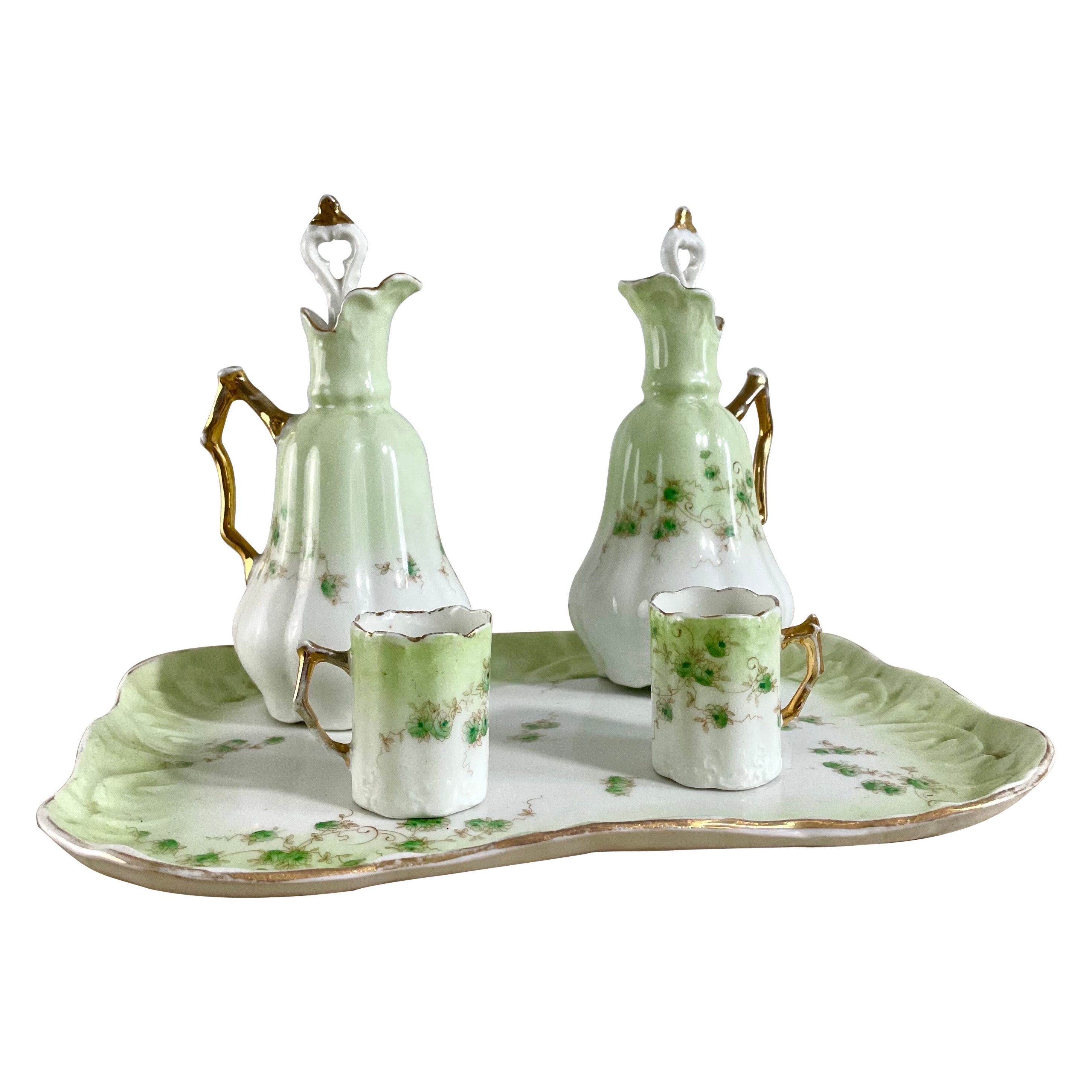 Französisches Likörservice „Head to Head“ aus Art nouveau-Porzellan, 19. Jahrhundert
