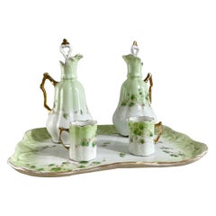 Servicio de licor francés "Cara a cara" de porcelana Art Nouveau, Siglo XIX