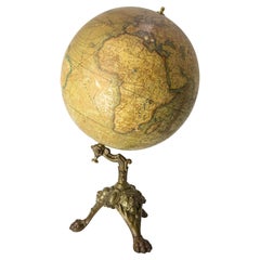 Globo terrestre francese litografato con base in ghisa dell'inizio del XX secolo