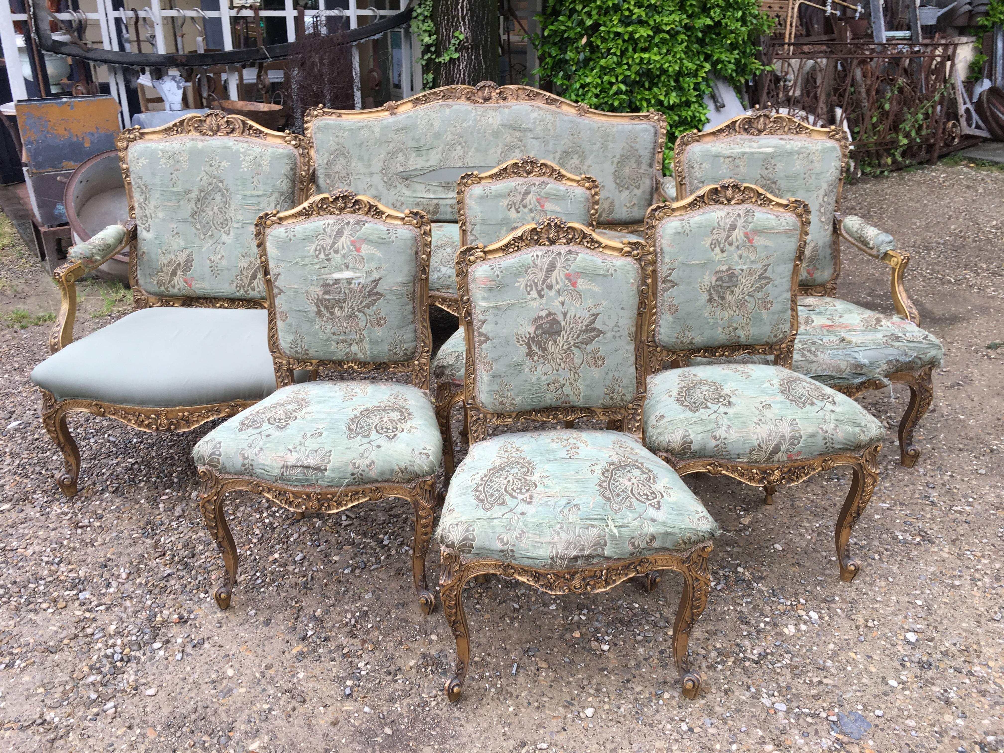 French living room set in gilt carved wood and original brocade fabric from 19h century in the style of Louis XV.
This set is in his original conditions and need to be restaured and reupholstered.
On demand we can provide quotation for