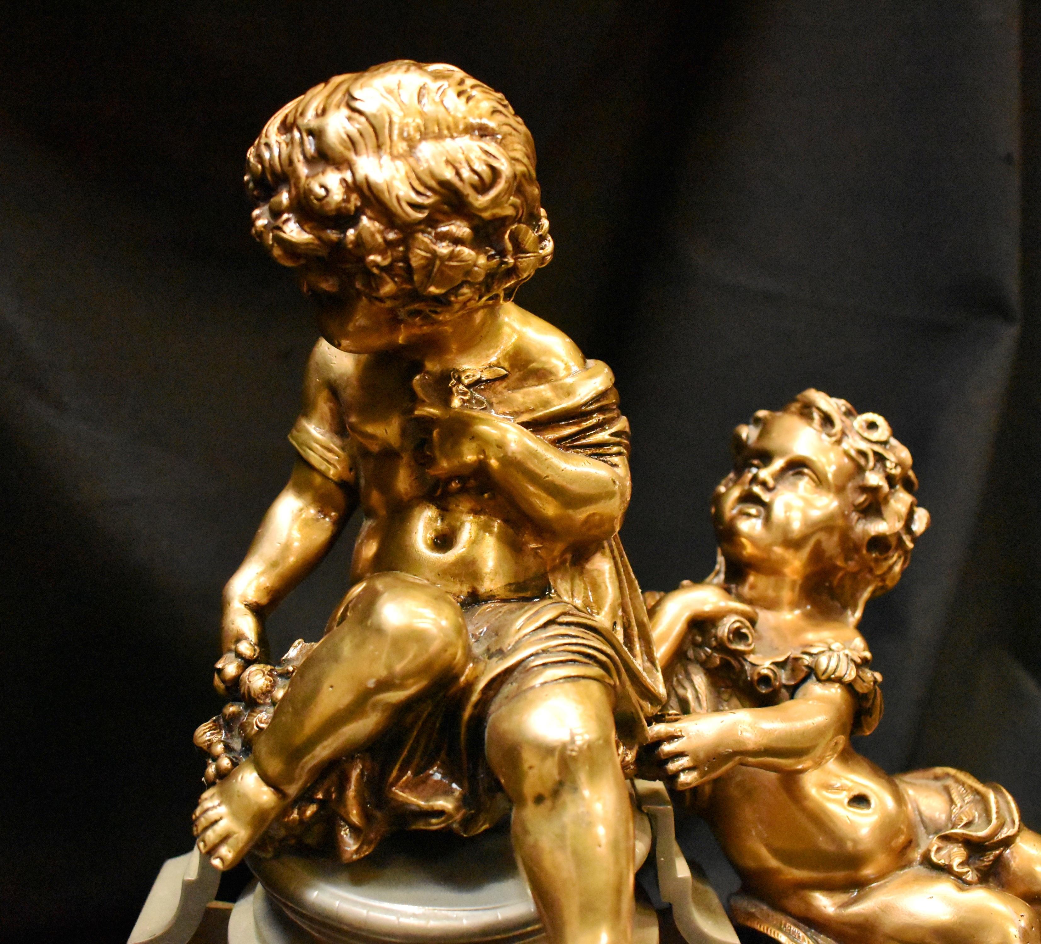 Gilt French Long Chenet Fire Fender with Putti, 19 Century For Sale