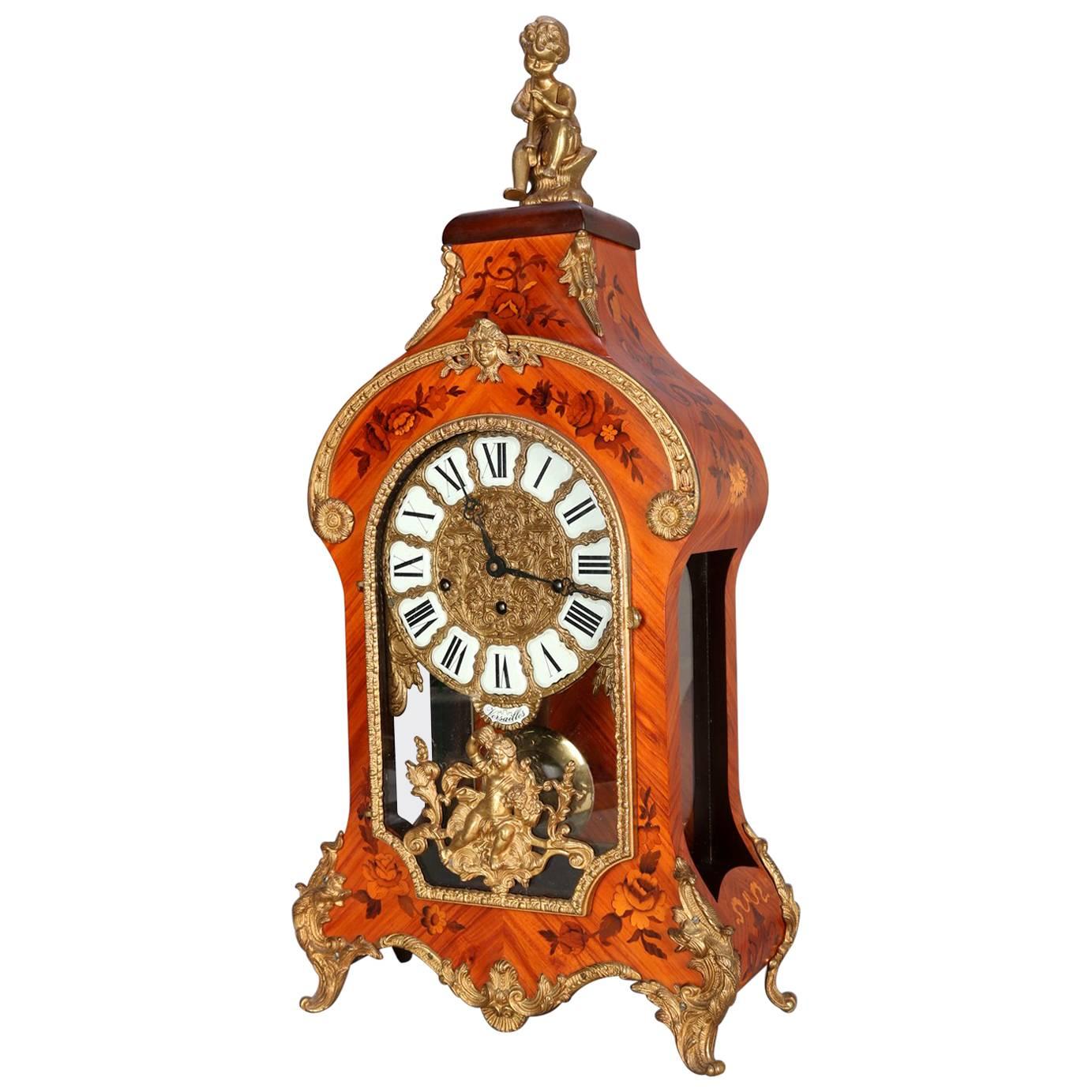 French Louis IV Style Inlaid Kingwood and Ormolu Figural Bracket Clock