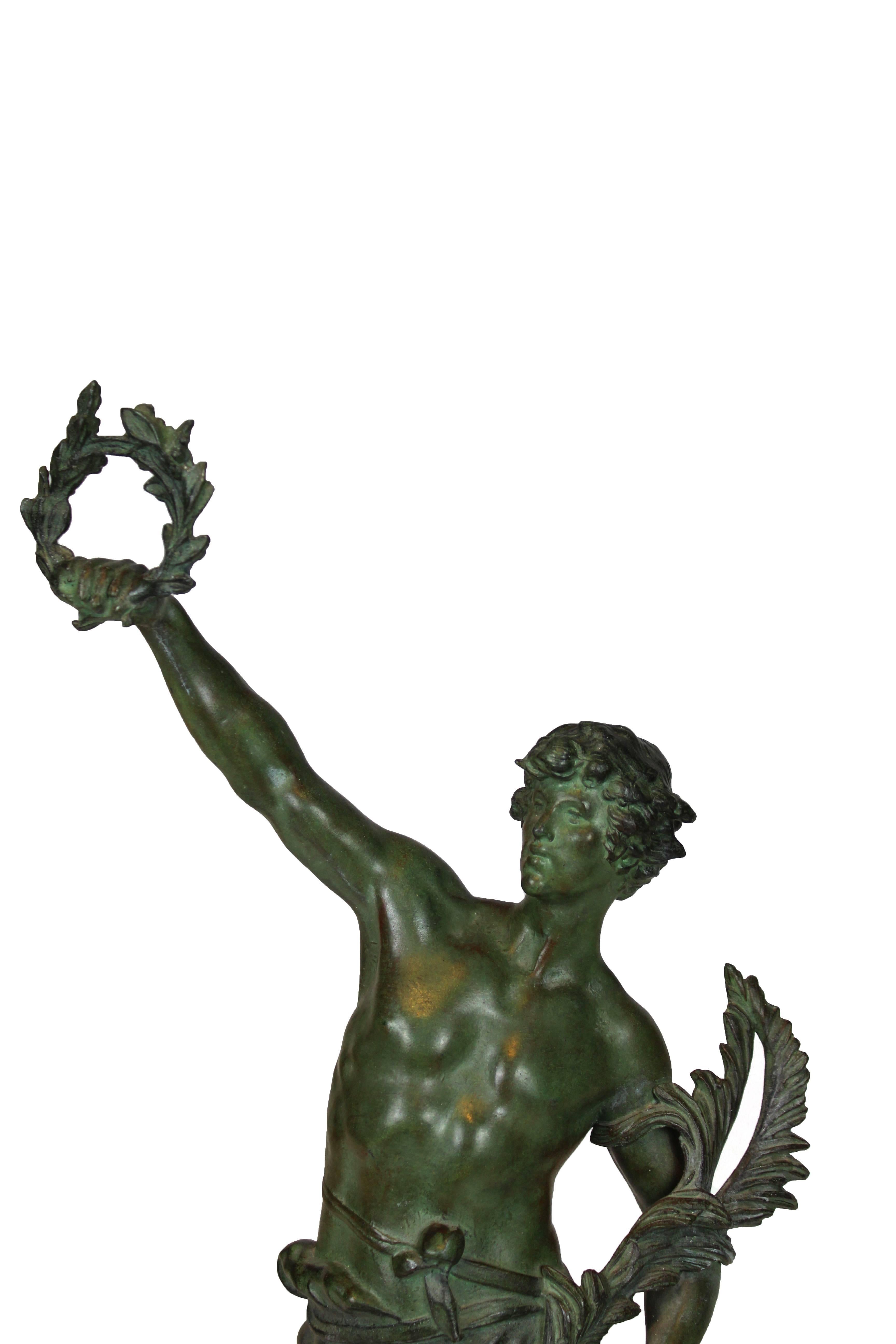 Statue made and signed by Louis Moreau (1855-1919). Made of bronze and the base of marble. The figure shows the triumphant Apollo. Excellent conditions.