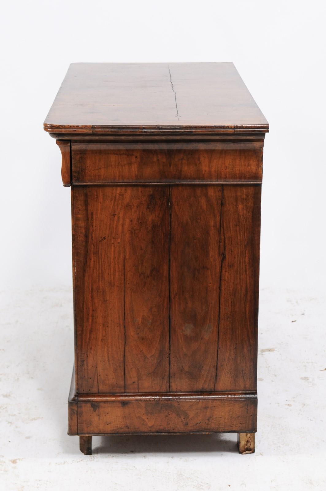 French Louis-Philippe five-drawer burled wood commode from the mid-19th century, with bookmark veneered front, frieze drawer and hidden drawer. We’re always on the hunt for pretty, burled wood Louis-Philippe commodes, and when we spotted this one in