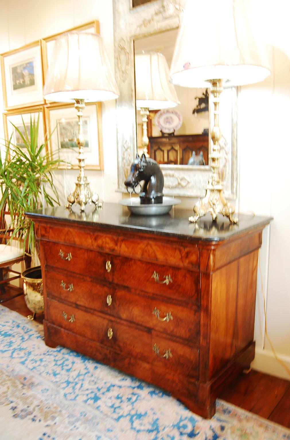 French Louis Philippe burl walnut and walnut chest of four drawers.  The four drawers are burl walnut, the carcass is walnut and the top is the original black marble which even has a beautifully petrified mollusc shell in the middle.  The bottom