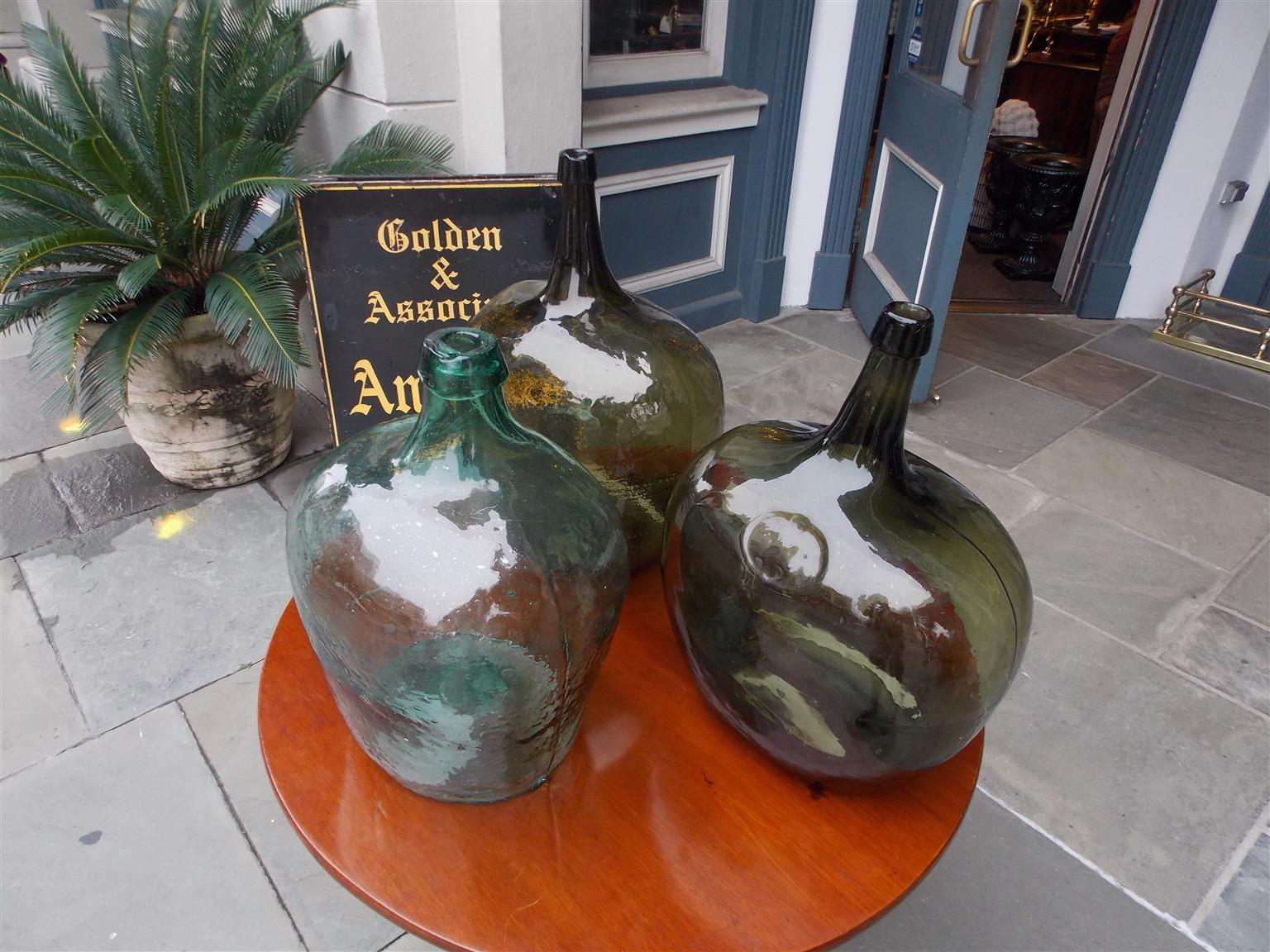 Mid-19th Century French Hand Blown Three Decorative Bulbous Colored Glass Wine Jugs, Circa 1860