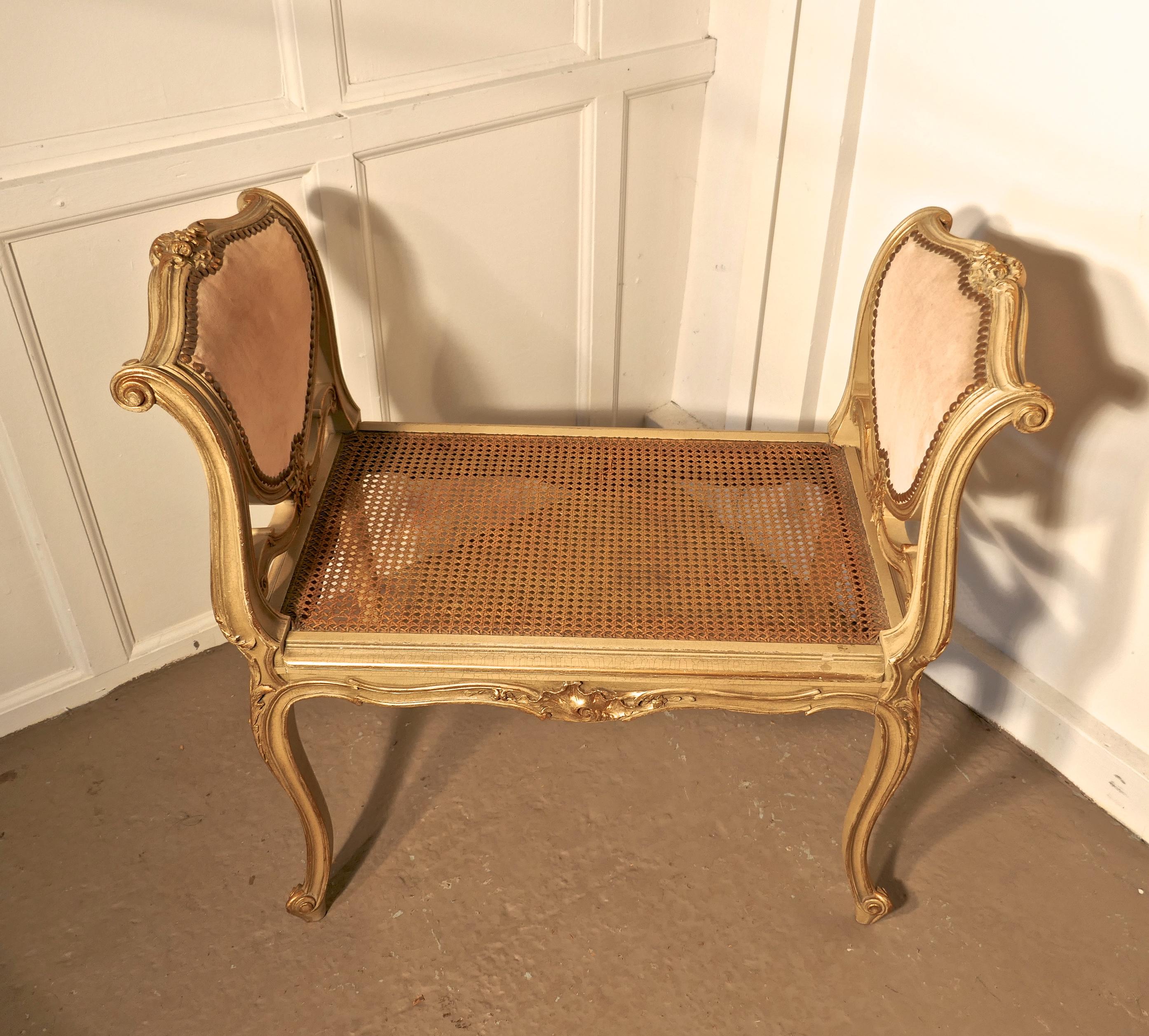 French Louis Philippe Dusky Pink  and Gilt Boudoir Window Seat

This is a delightful Piece of Louis Style Painted Chic furniture, the high arms on either side has heart shaped panels upholstered in dusky pink velour
The painted legs, arms and apron