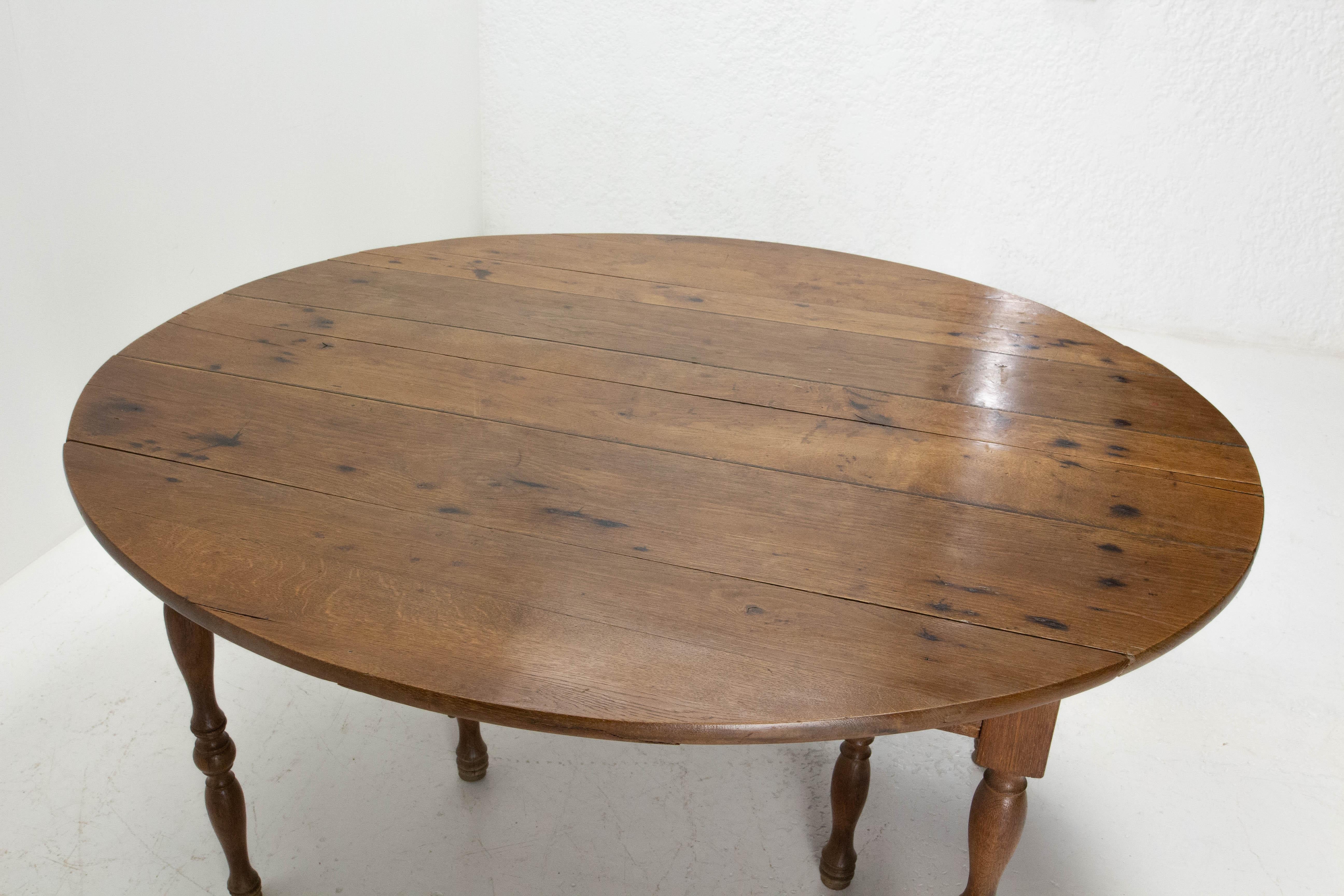 Louis Philippe oval dining folding table with drop leaves massive oak
Mid- 19th century, 
We sell it without the table extensions but with can make them for you in plywood if it is for receiving a tablecloth or in massive wood.
Dimensions of the