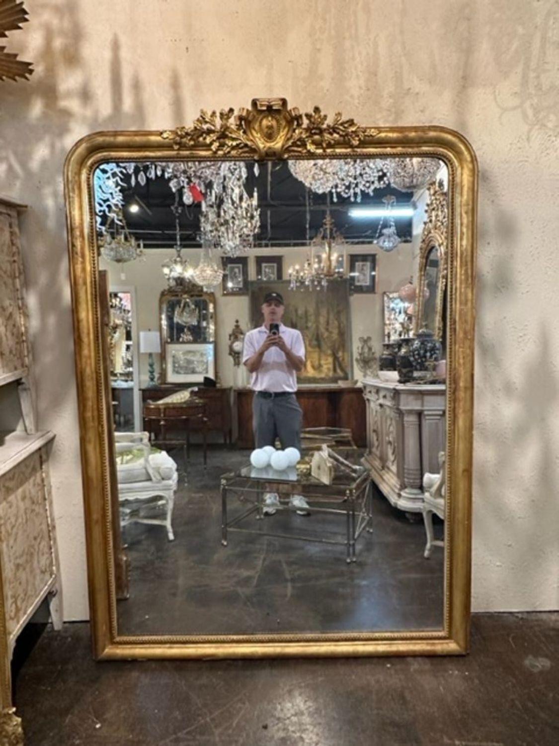 Fine large scale 19th century French Louis Philippe gold leaf floor mirror. Circa 1860. A favorite of top designers!