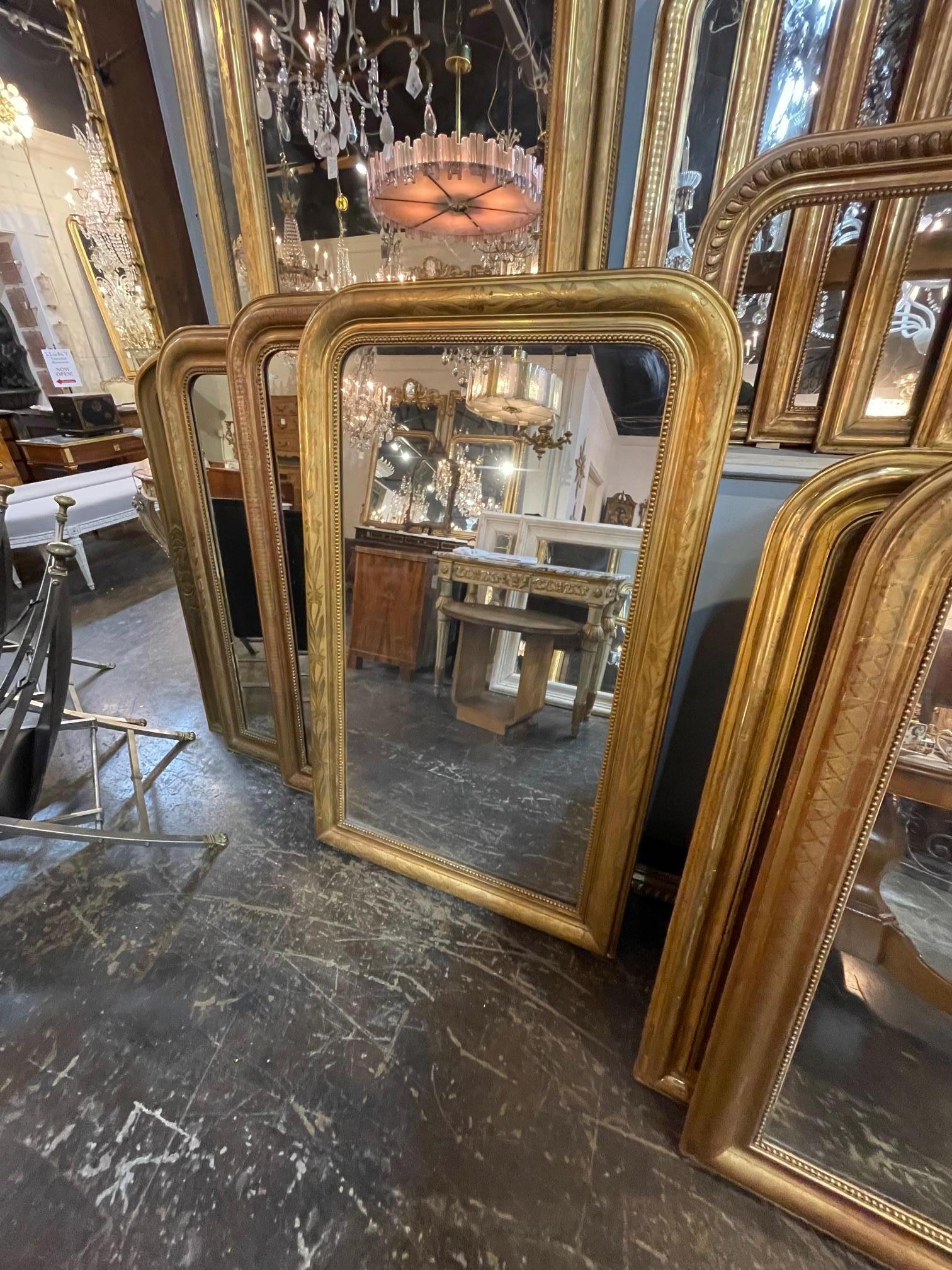 19th century French Louis Philippe mirror with floral pattern. Circa 1860. A fine addition to any home.