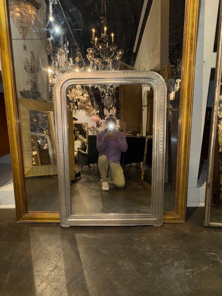 19th century French Louis Philippe silver leaf mirror with X pattern frame. Circa 1890. A timeless and classic touch for a fine interior. 32w x 47h