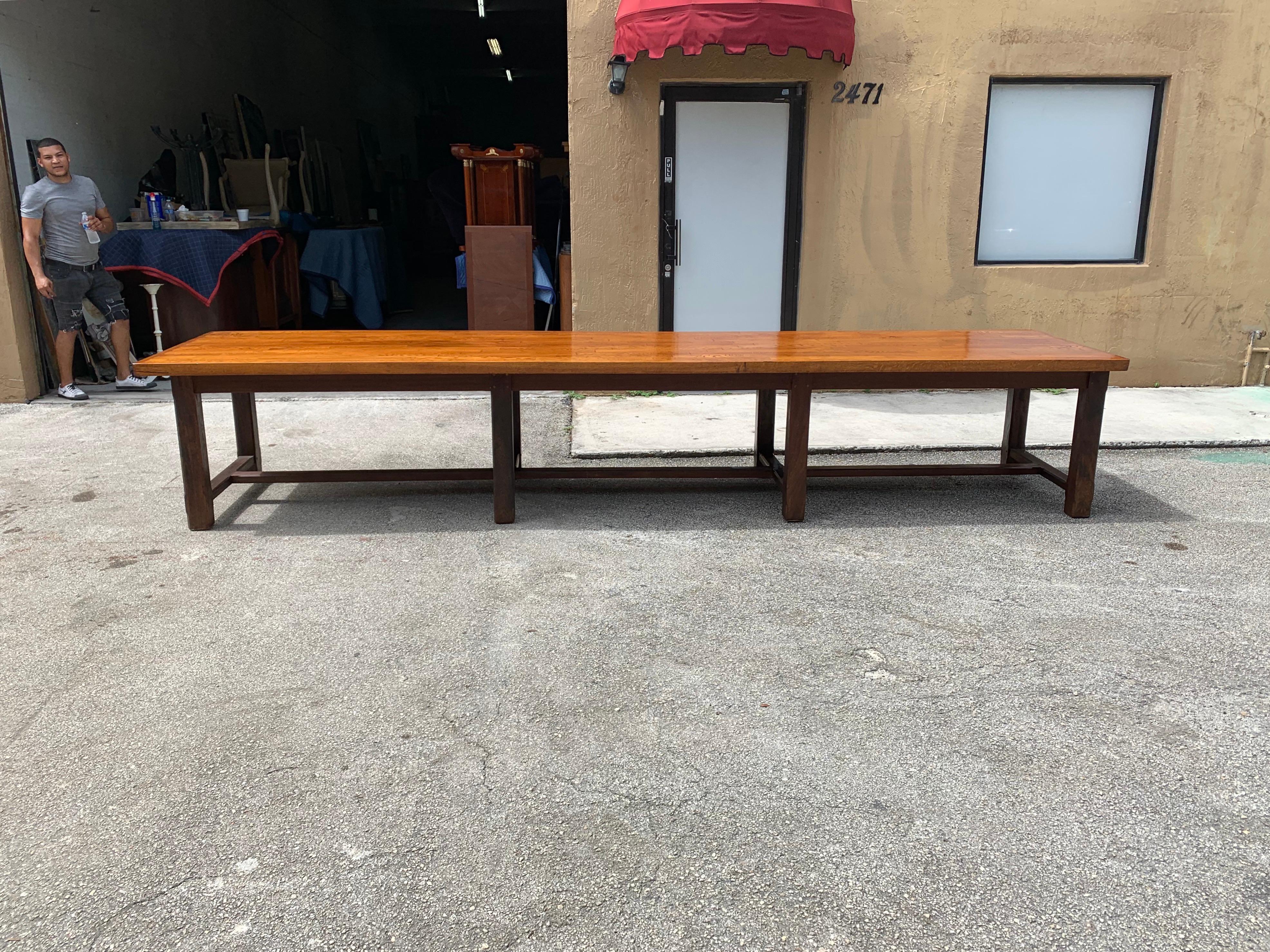 Monumental 19th century rectangular Louis Philippe period chateau farm table or Monastery Table. having a thick plank oak top supported by 8 Square thick legs walnut and joined by 3 H stretcher. This handsome dining table retains its beautiful rich,