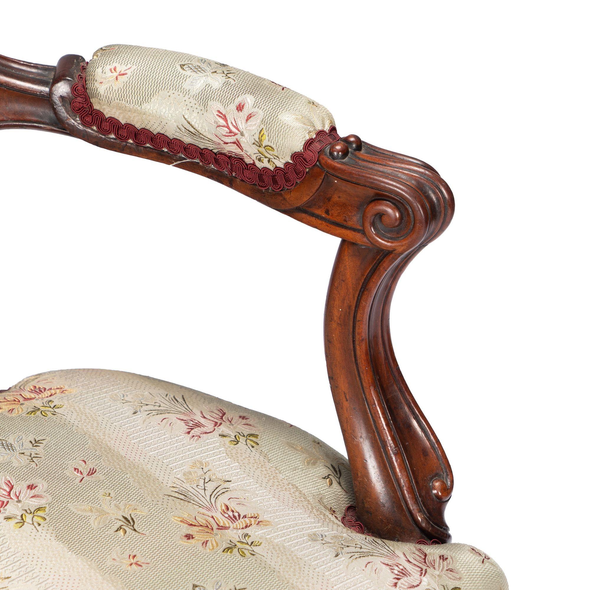 French Louis Philippe period walnut arm chair with paired footstool, c. 1850's For Sale 6
