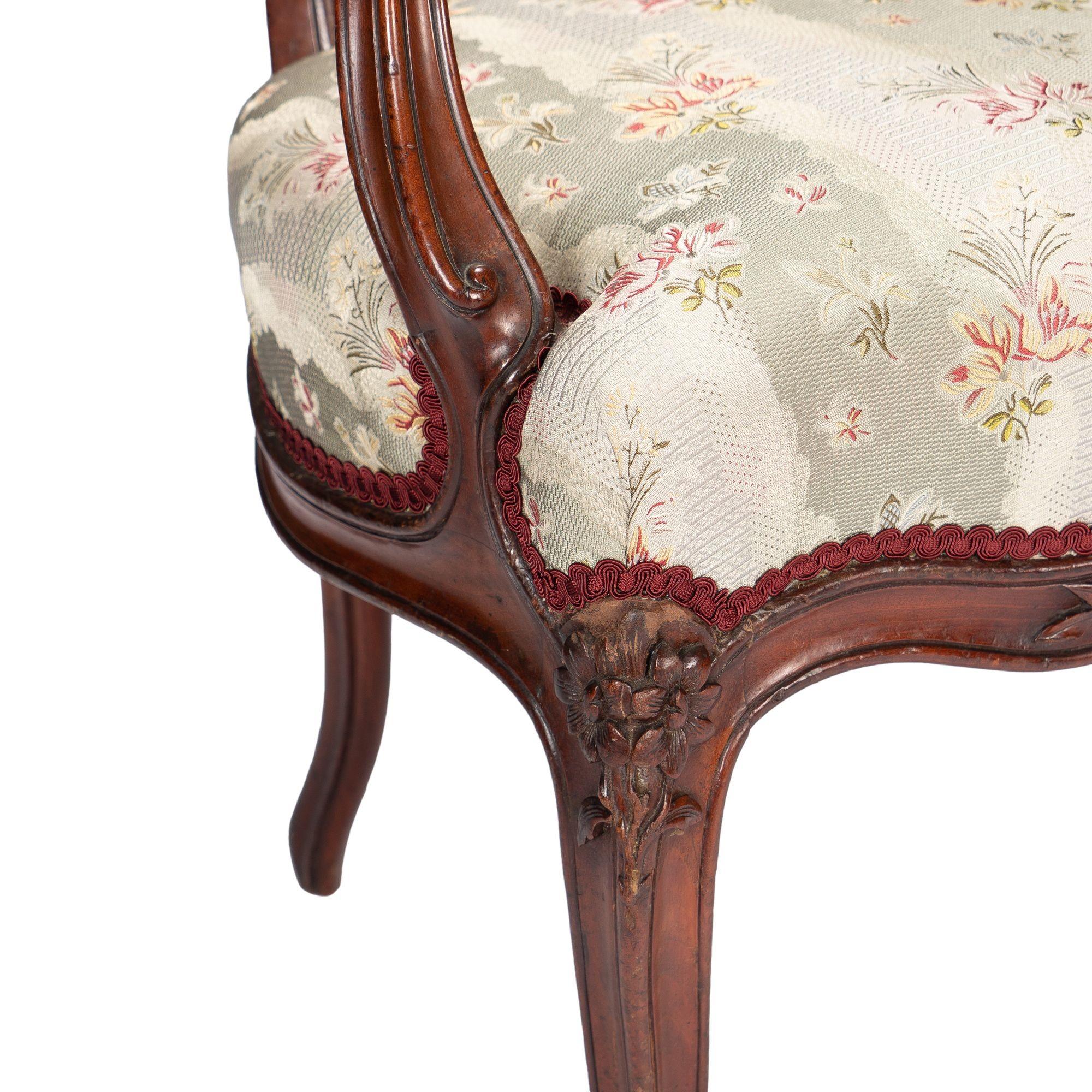 French Louis Philippe period walnut arm chair with paired footstool, c. 1850's For Sale 7