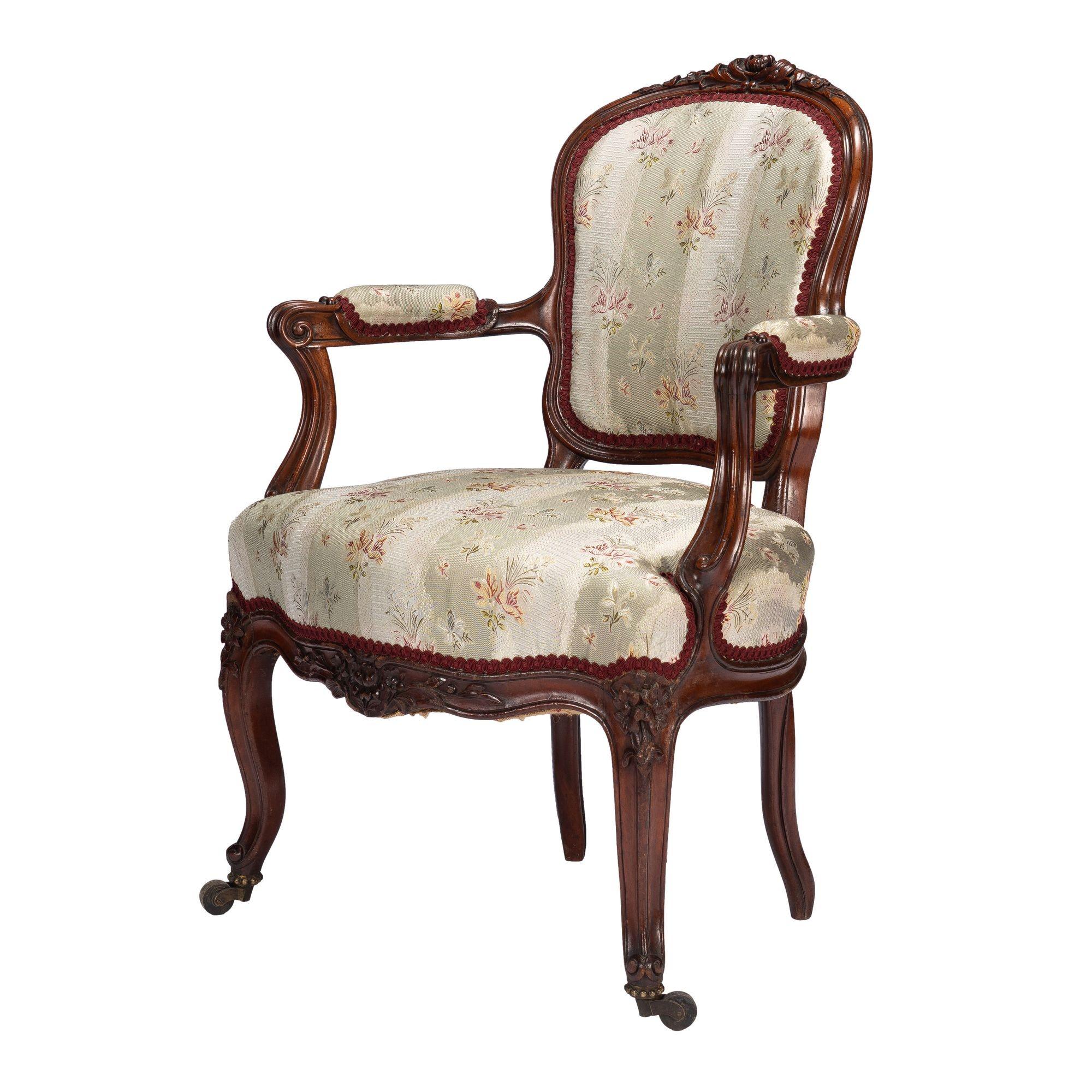 French Louis Philippe period walnut arm chair with paired footstool, c. 1850's In Good Condition For Sale In Kenilworth, IL