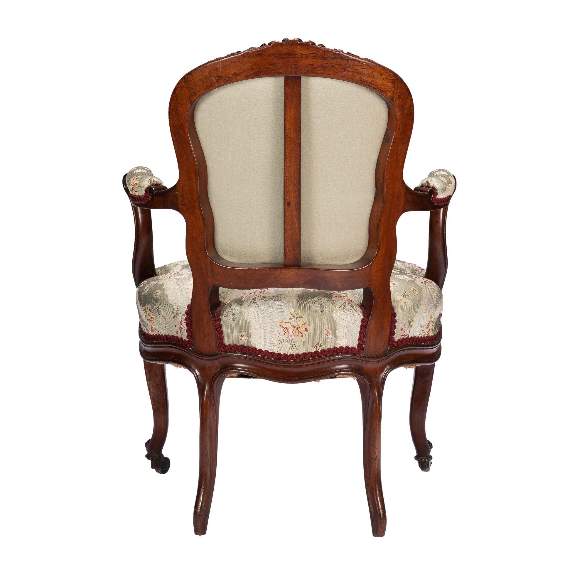 French Louis Philippe period walnut arm chair with paired footstool, c. 1850's For Sale 1