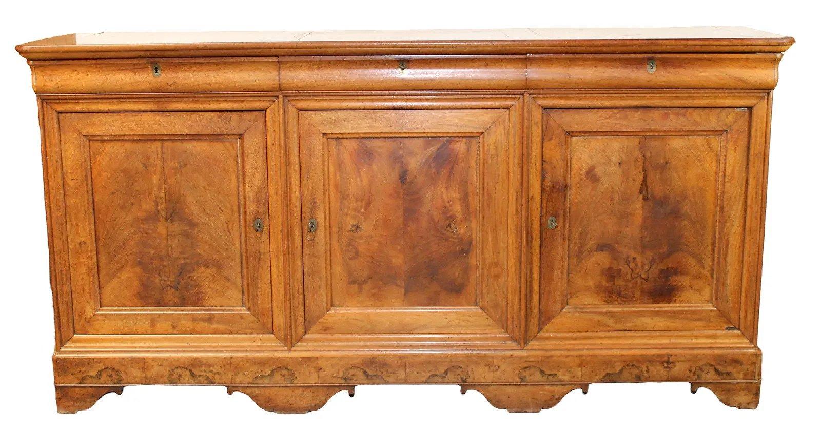 A fine Louis Phillipe Enfilade sideboard having three drawers over three doors. Late 19th Century. 
Dimensions: Height 47 1/2