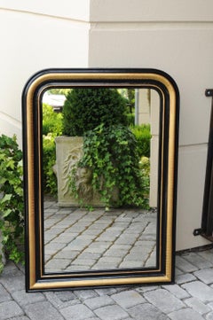 French Louis-Philippe Style Mirror with Ebonized Frame and Gilt Accents, 1900s