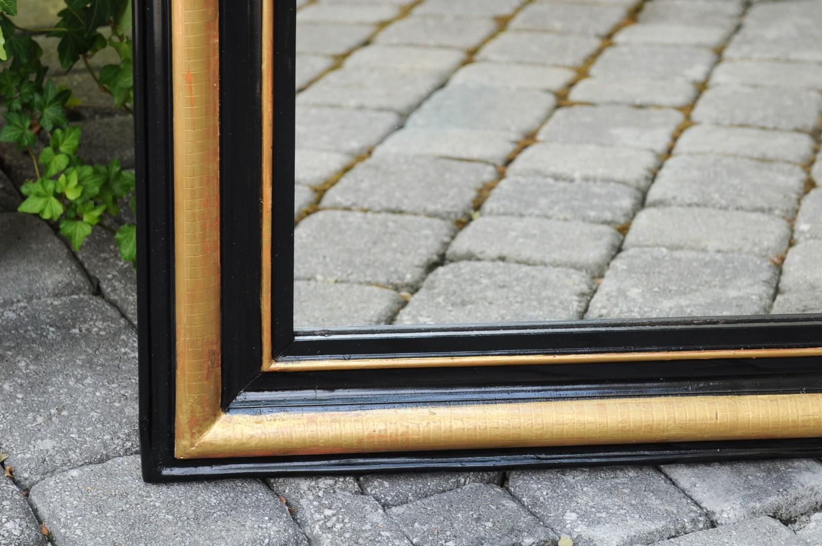 French Louis-Philippe Style Mirror with Ebonized Frame and Gilt Accents, 1900s In Good Condition For Sale In Atlanta, GA