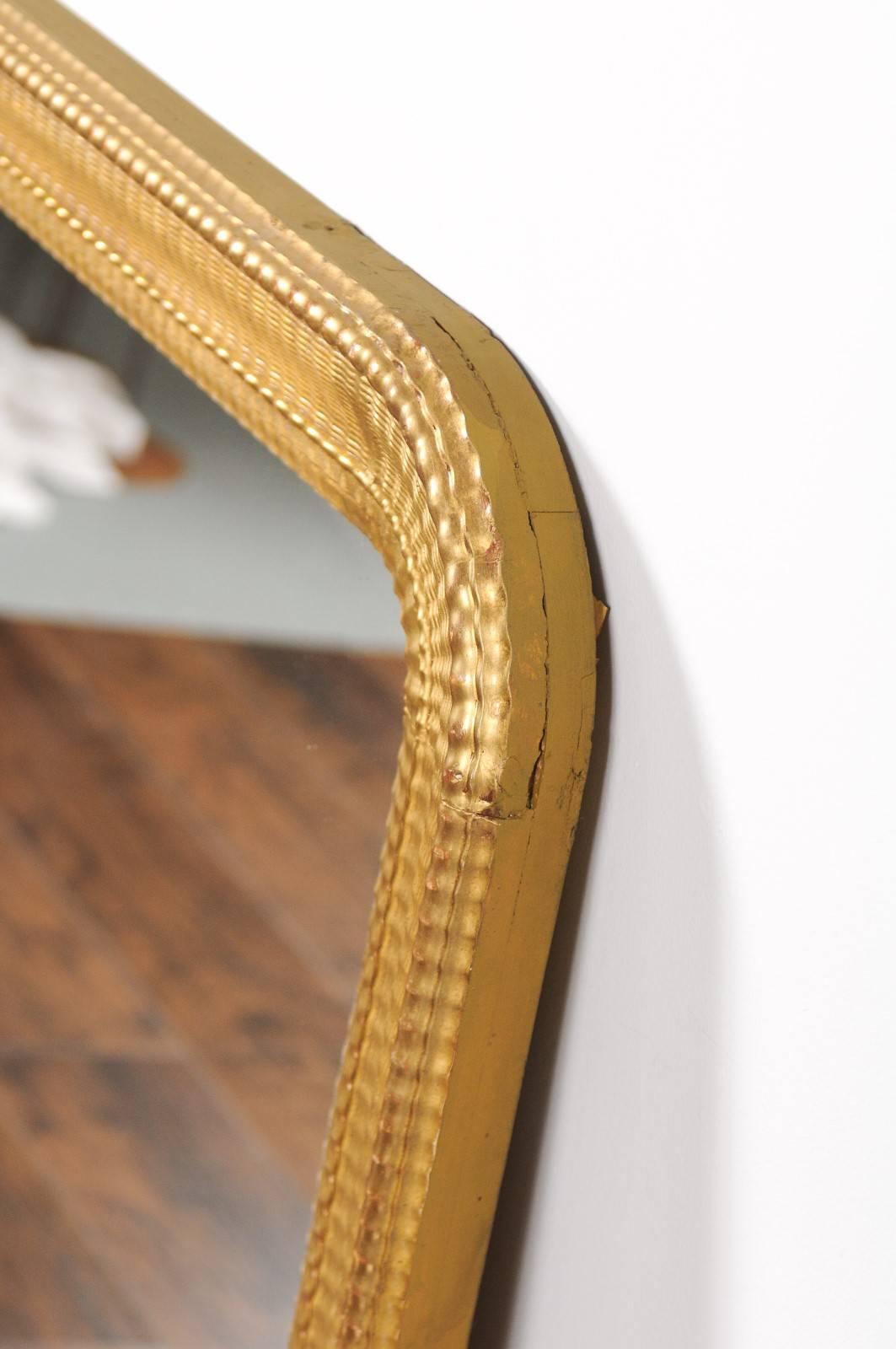 French Louis-Philippe Style Ridged Giltwood Mirror from the Early 20th Century 1